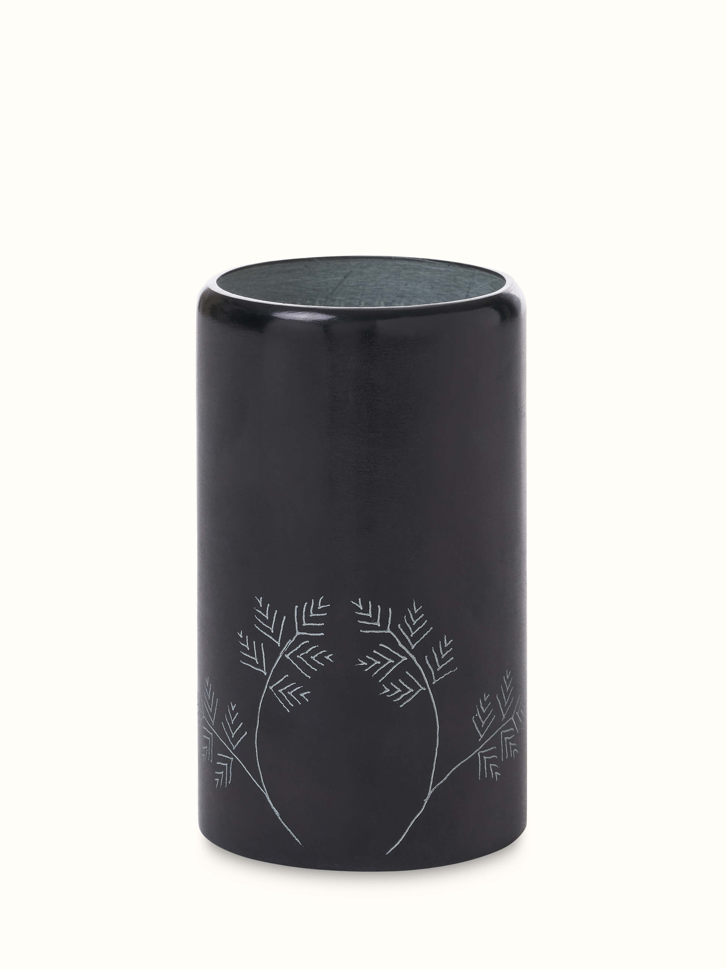 Front view of glossy carved stone toothbrush holder showcasing smooth finish and elegant carving