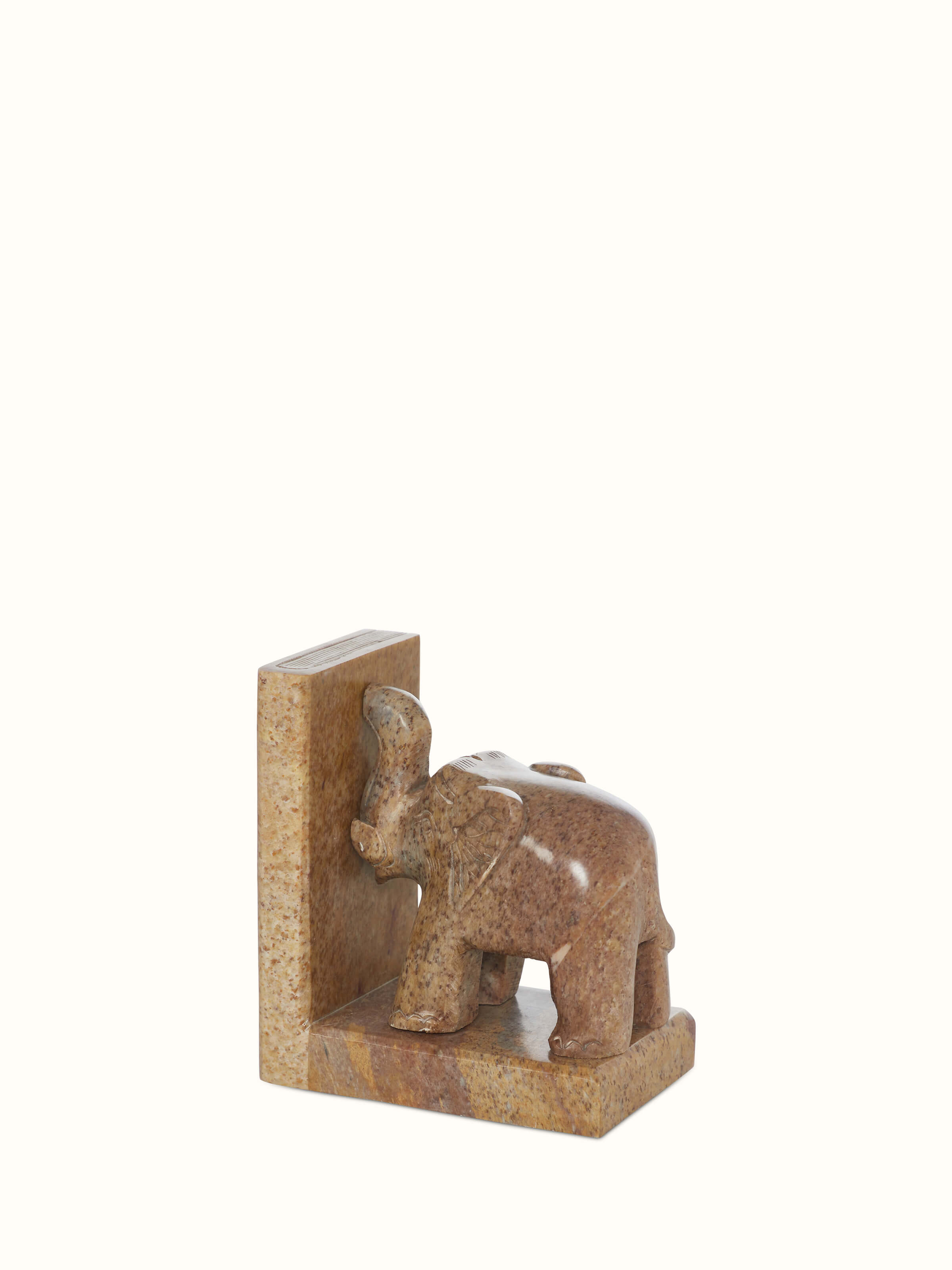 Close-up view of Carved Stone Bookend in Brown Color, emphasizing the intricate carvings and stone finish