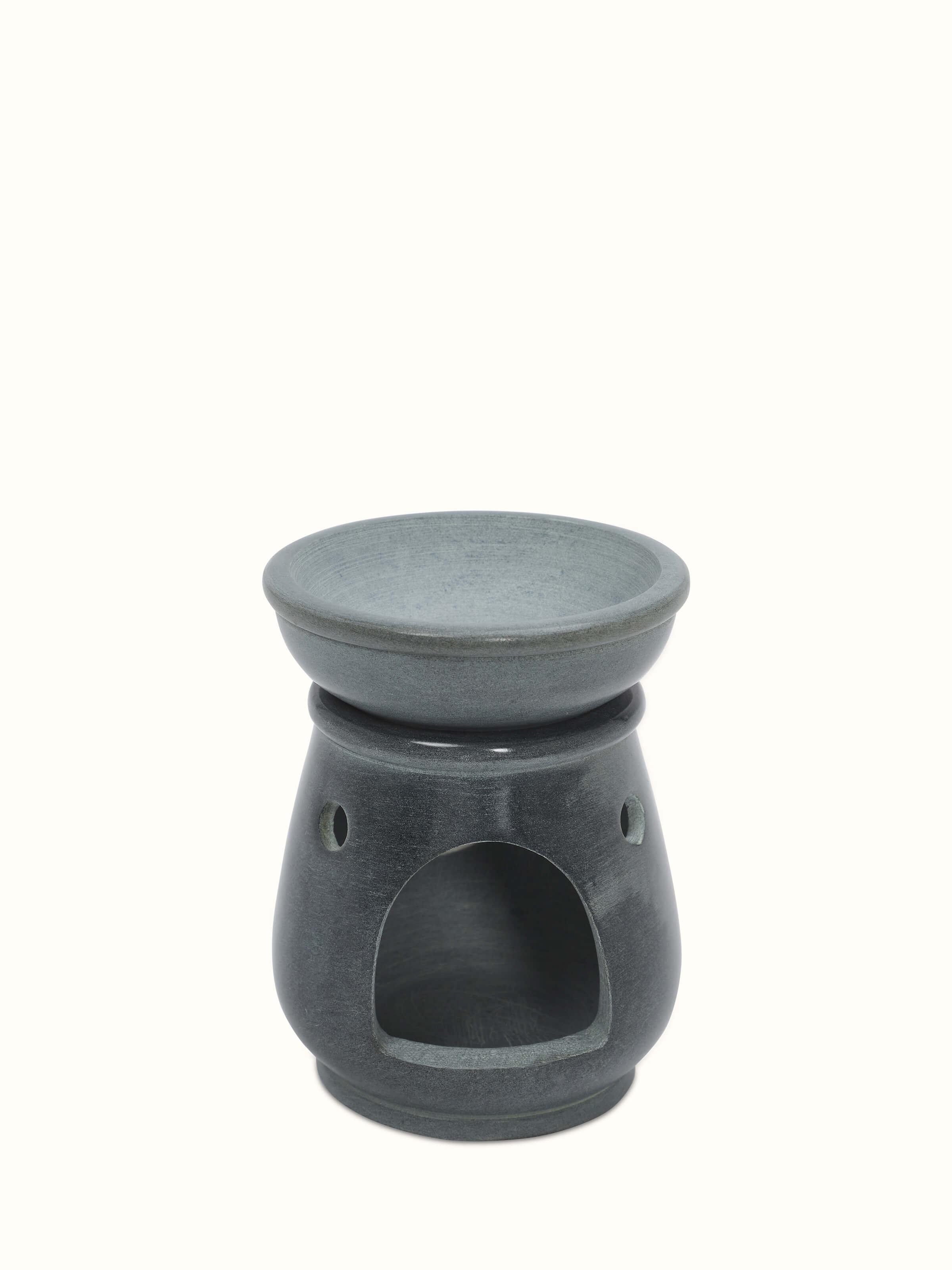 Detailed view of Traditional carved stone diffuser showcasing its fine details and craftsmanship.