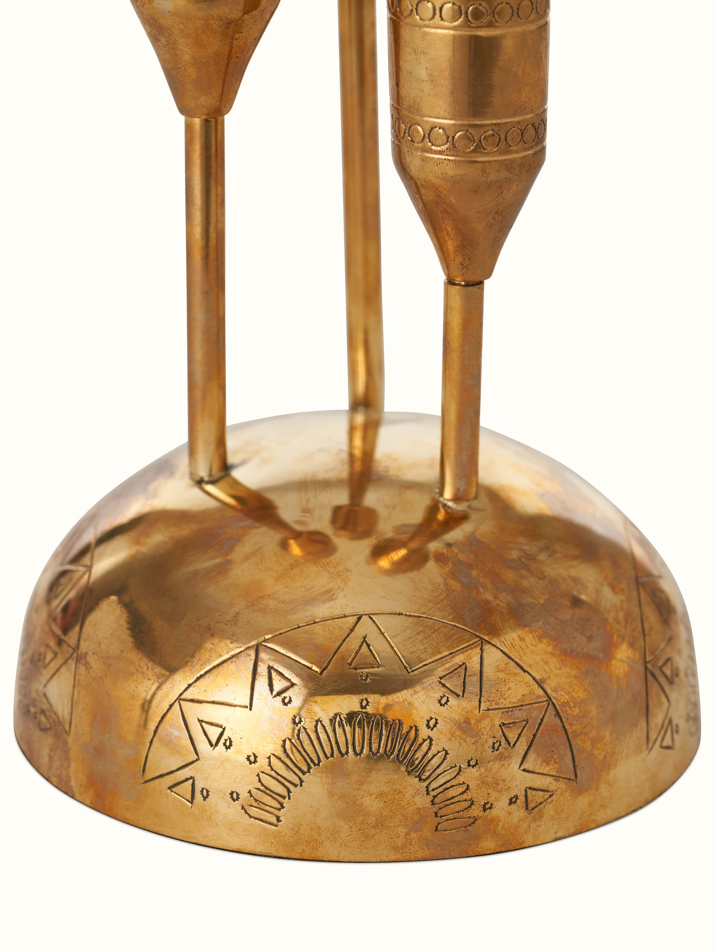 Full view of Brass candle holder in golden color showing complete design and artistic features.