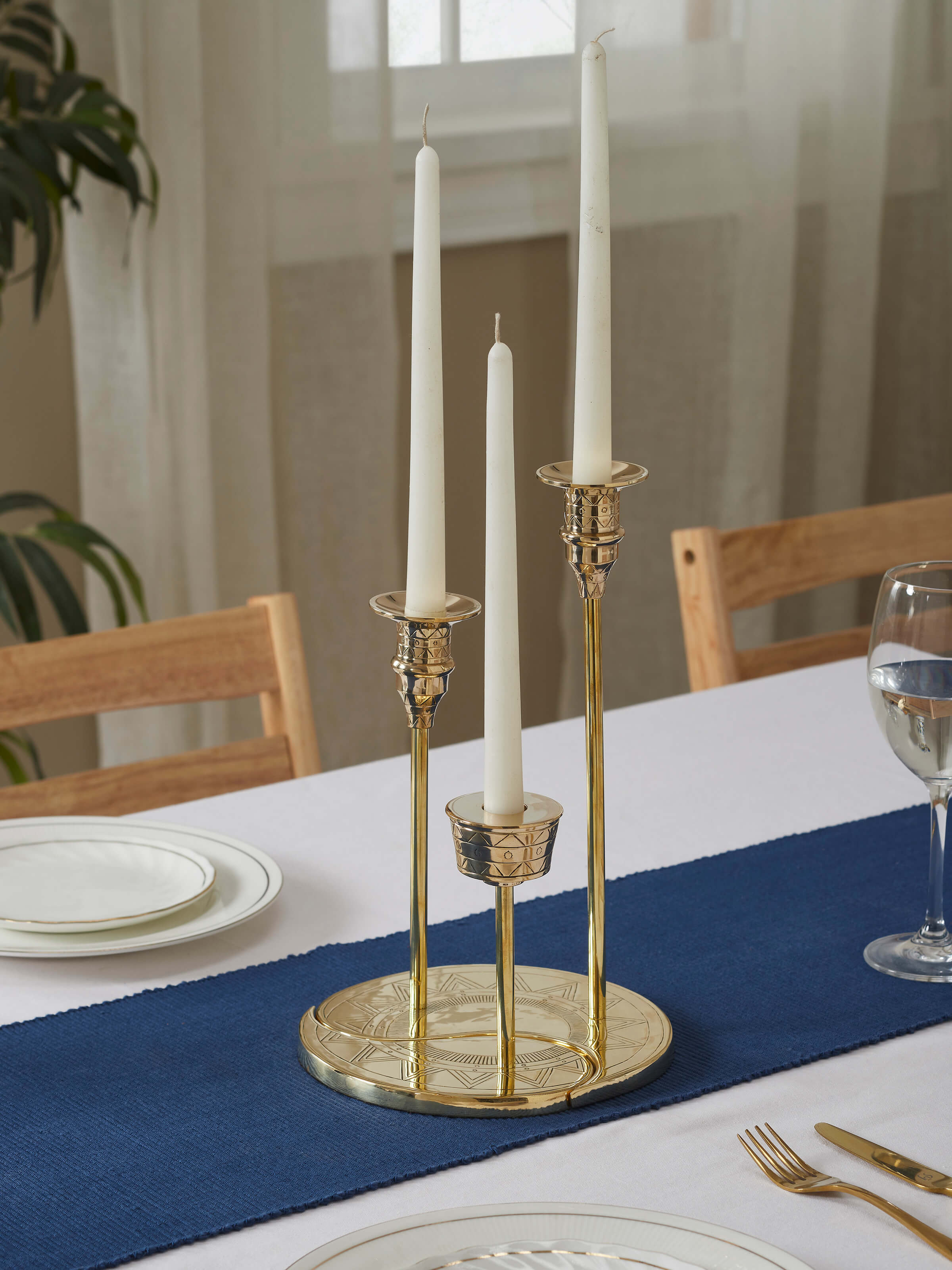 Close-up view of grey brass candle stands (2 pcs), highlighting the detailed craftsmanship and finish.