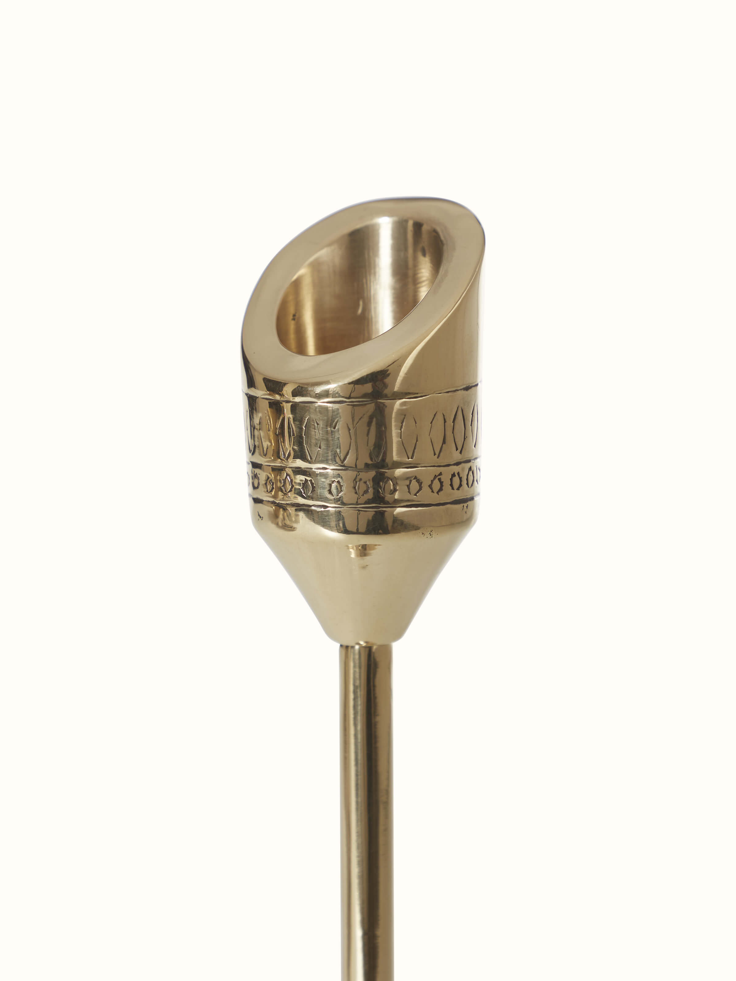 Natural brass candle stand from a different angle, highlighting its design features.