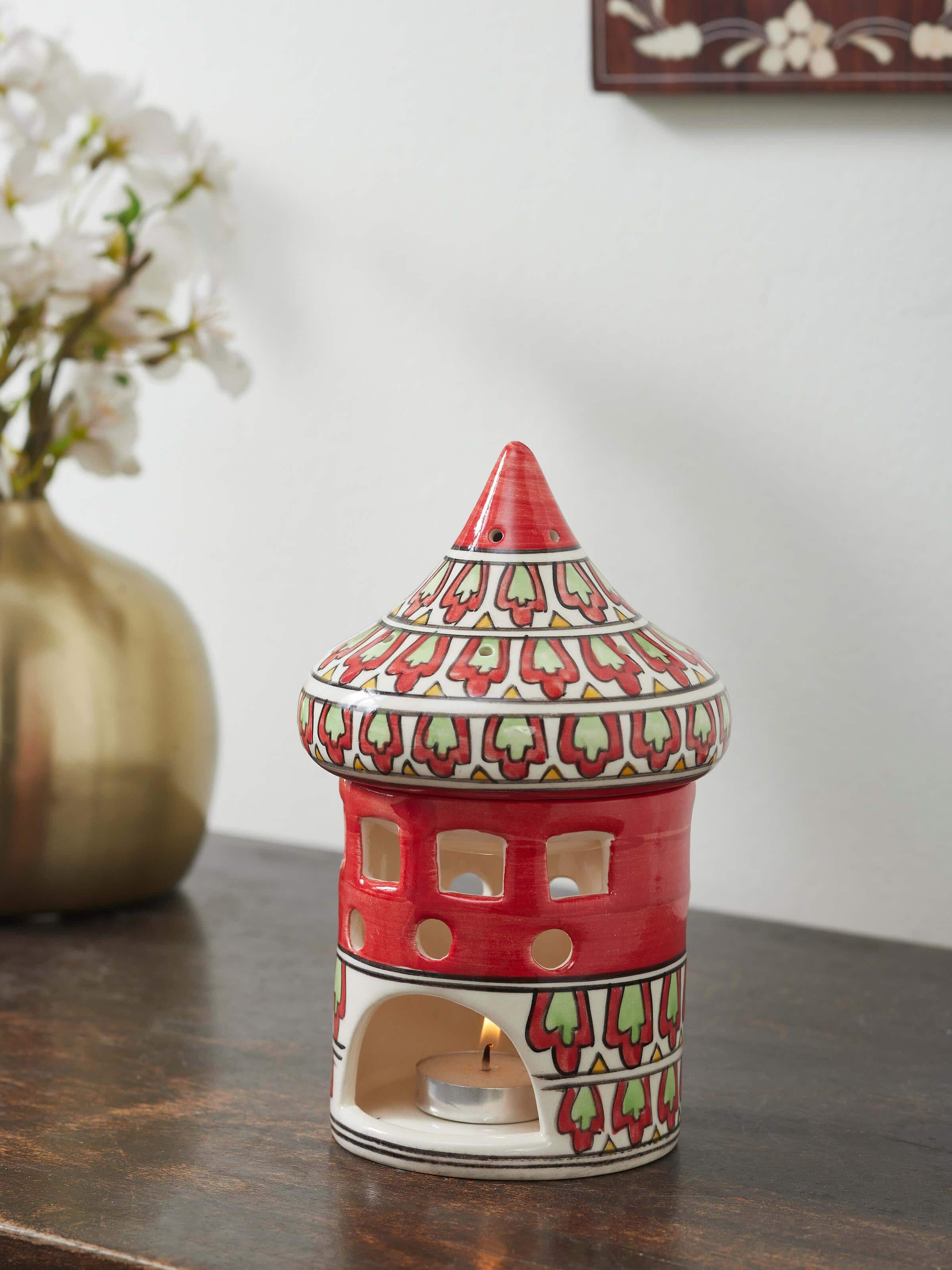 Close-up view of natural Khurja pottery ceramic aroma oil burner emphasizing the detailed ceramic work and rustic charm