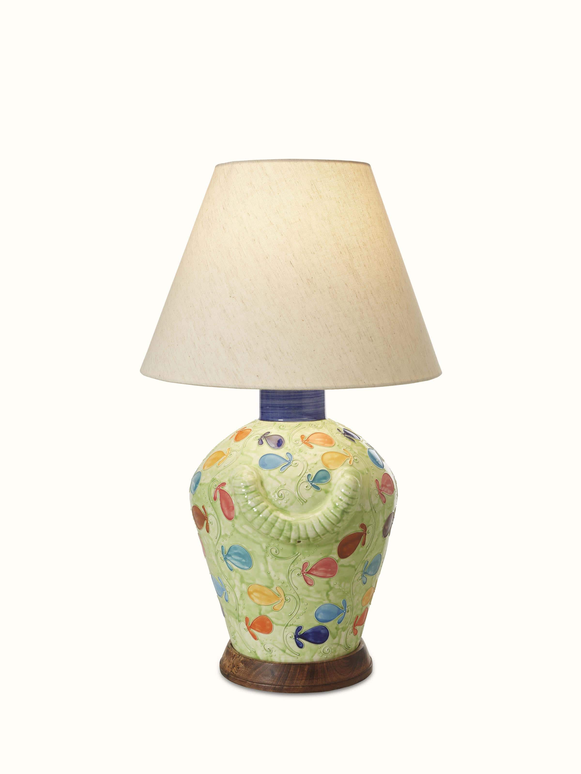 Khurja pottery ceramic table lamp (large) with traditional designs and vibrant colors, displayed with the lamp turned on.