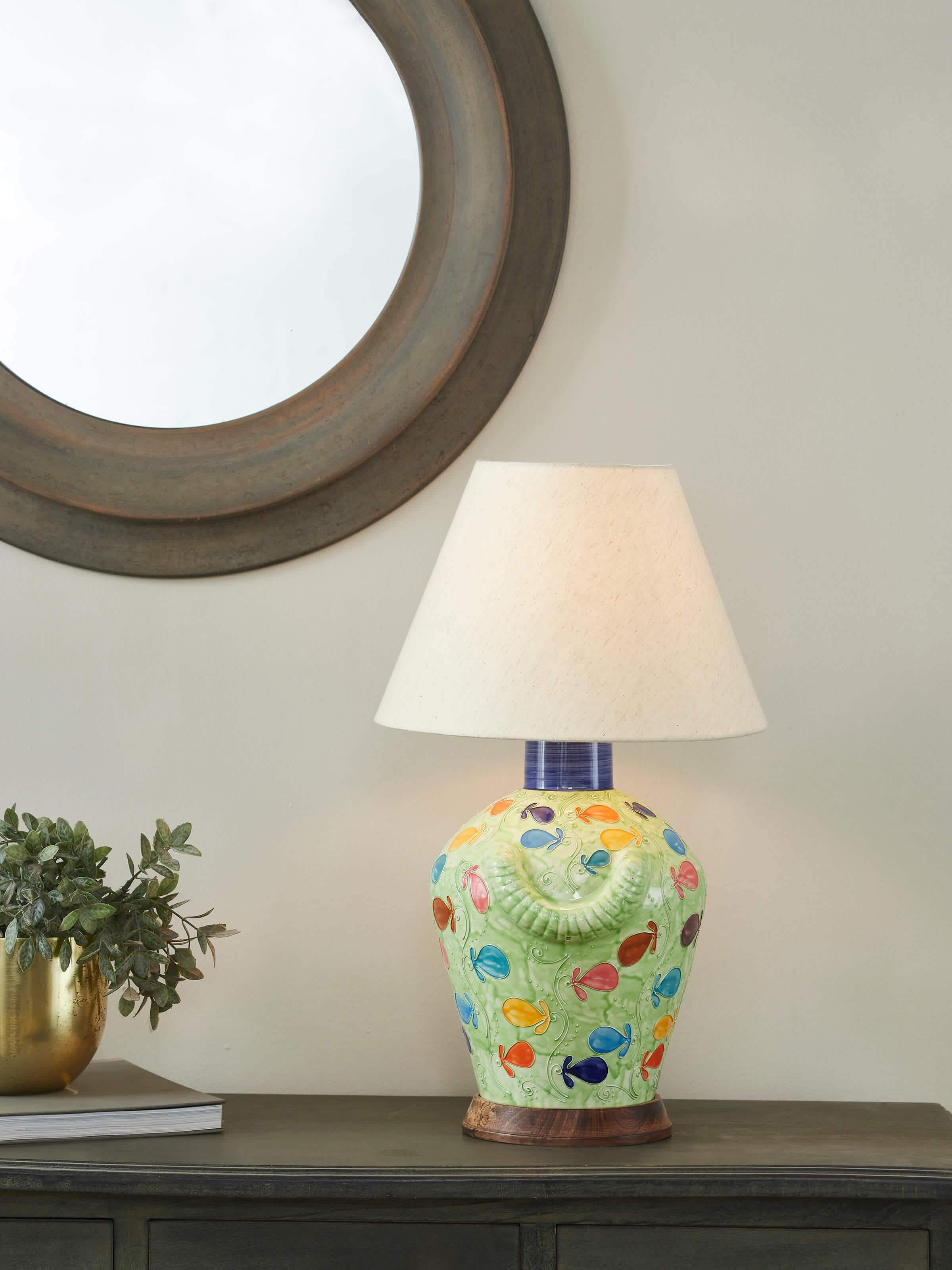 Side view of Khurja pottery ceramic table lamp (large), featuring its decorative patterns and functional design.