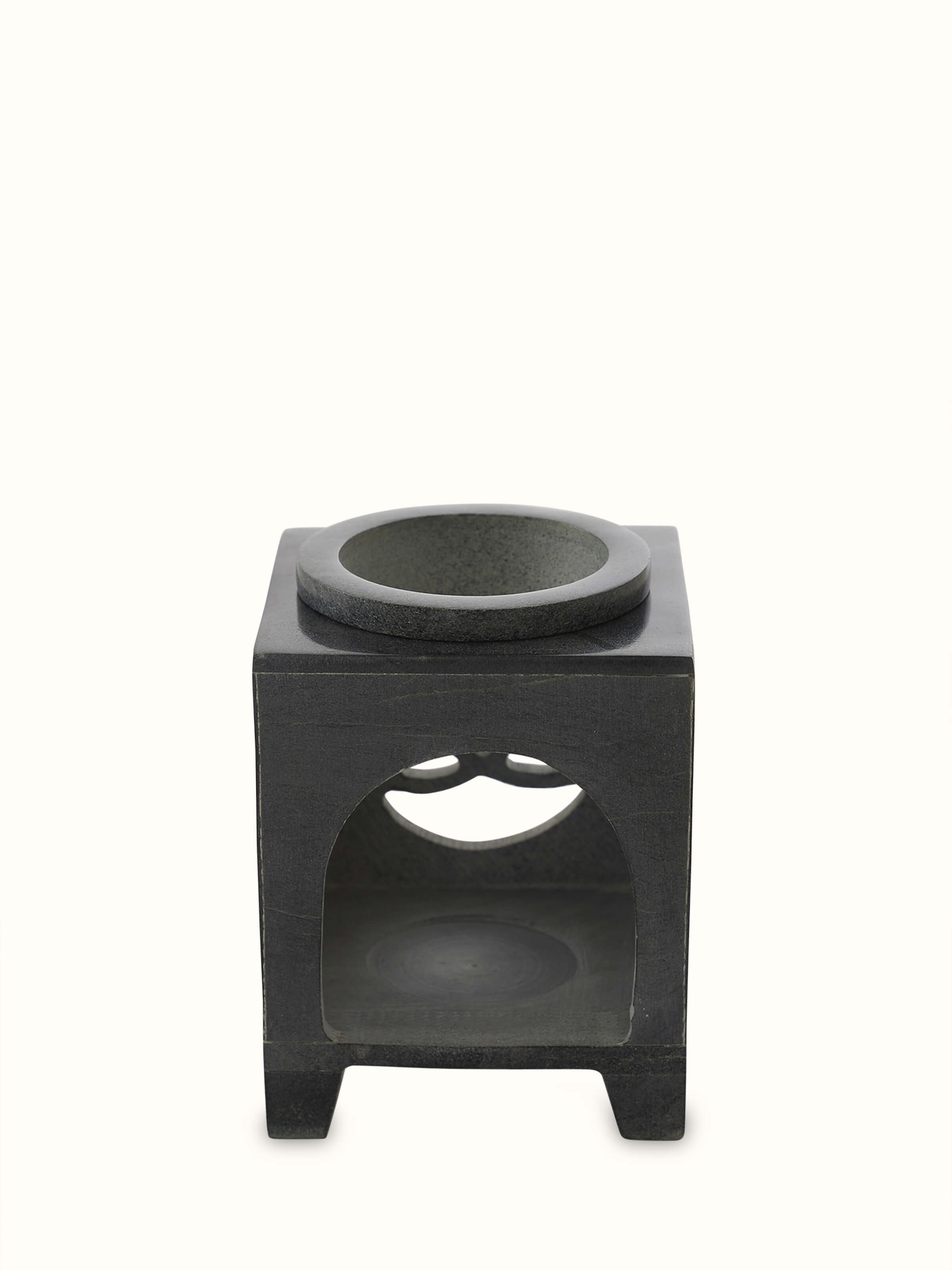 Front view of carved soapstone aroma oil burner & diffuser in black color showcasing intricate designs and craftsmanship