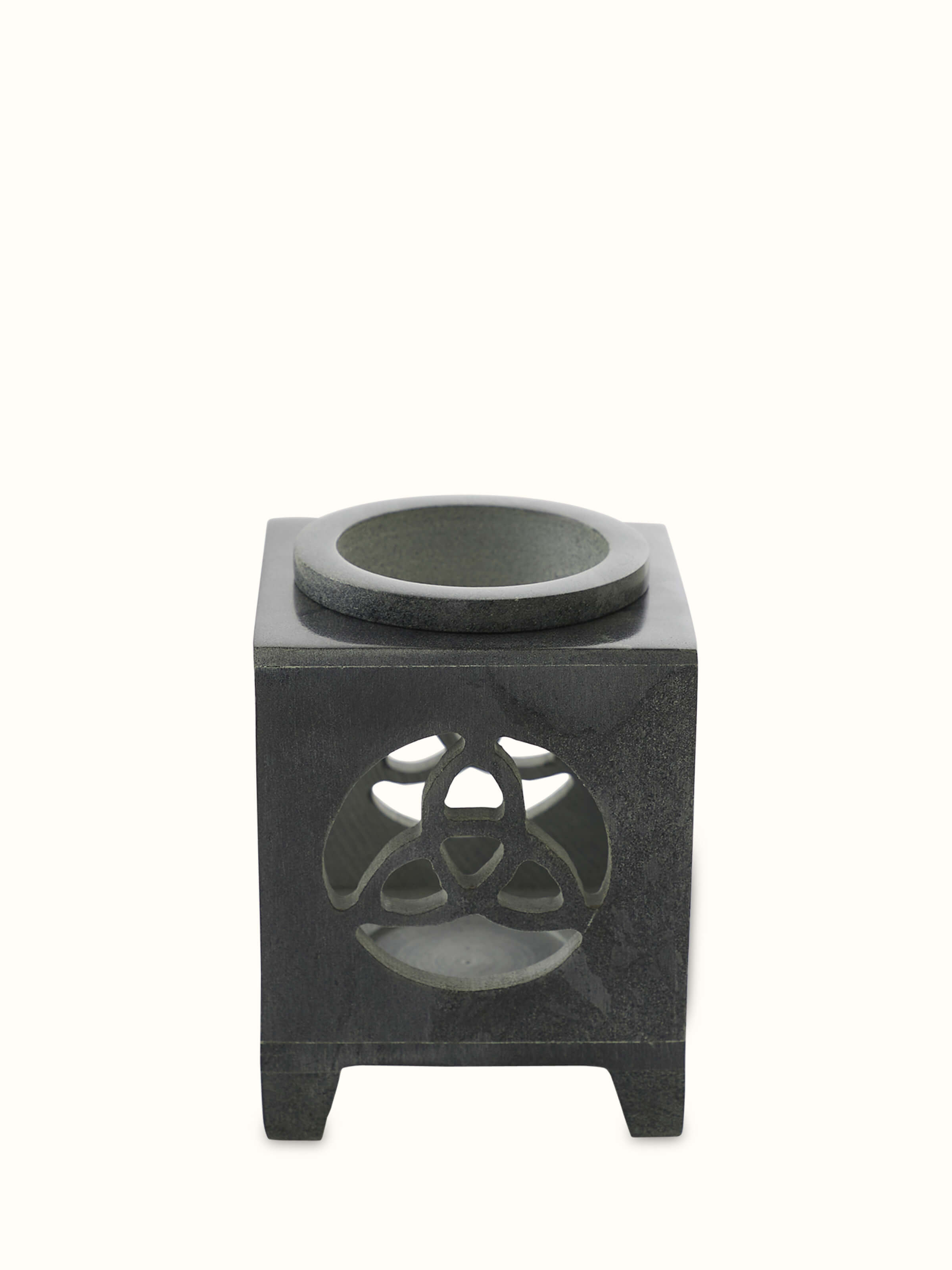 Angled view of carved soapstone aroma oil burner & diffuser in black color emphasizing the smooth finish and artistic design