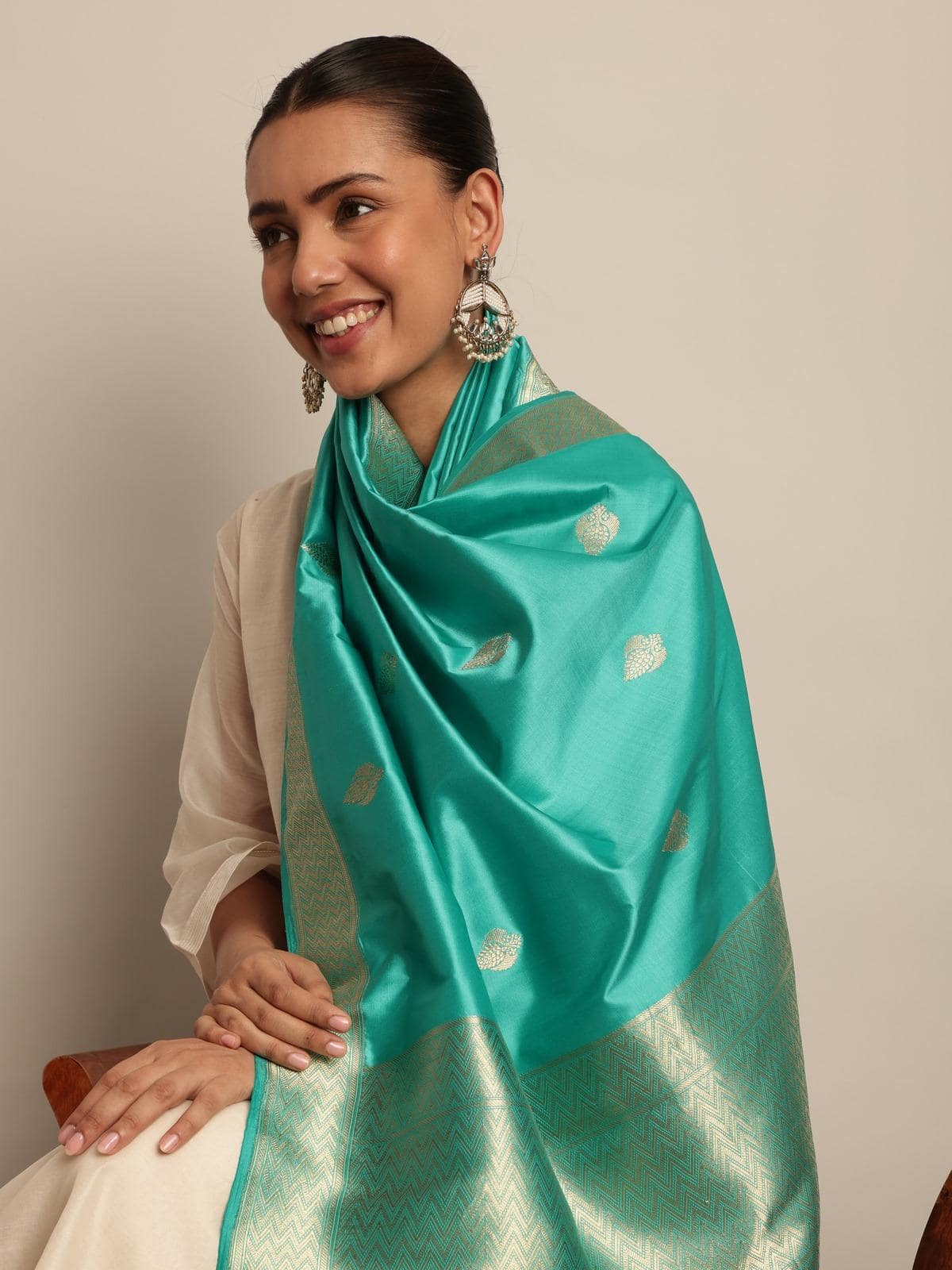 Angled view of Blue Silk Banarasi Dupatta showing detailed gold zari motifs and soft silk texture.