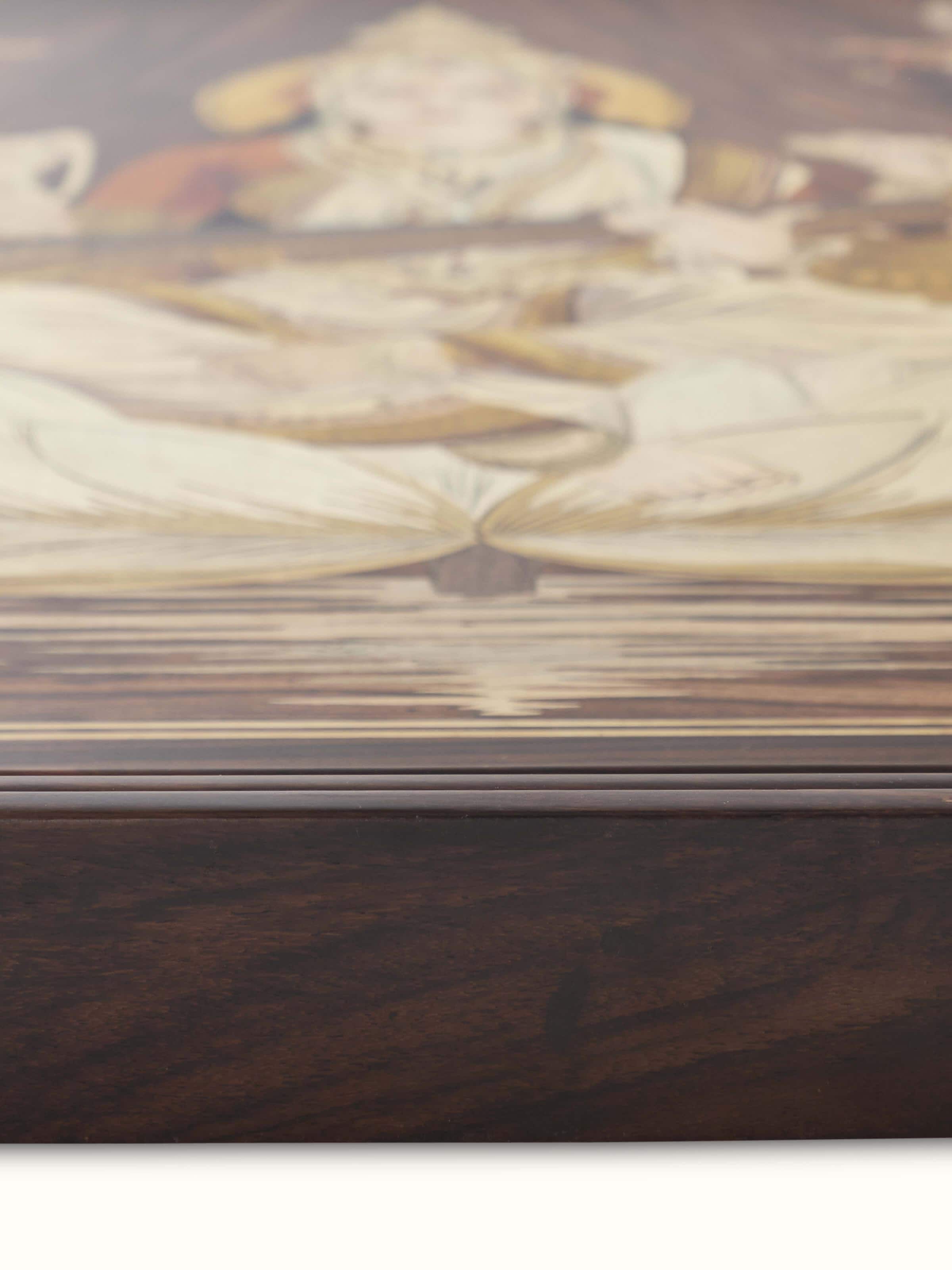 Angled view of Mysore rosewood inlaid Saraswathi wall art emphasizing the fine details and traditional craftsmanship