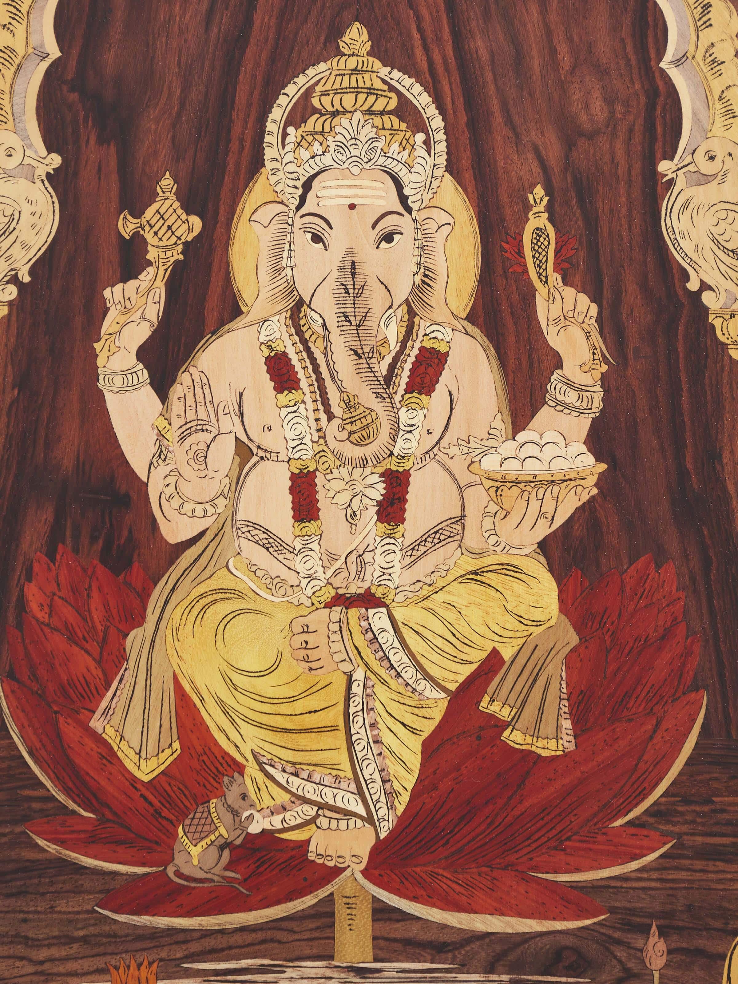 Angled view of Mysore Rosewood Inlaid Ganesha Wall Art revealing its overall artistic and traditional features.
