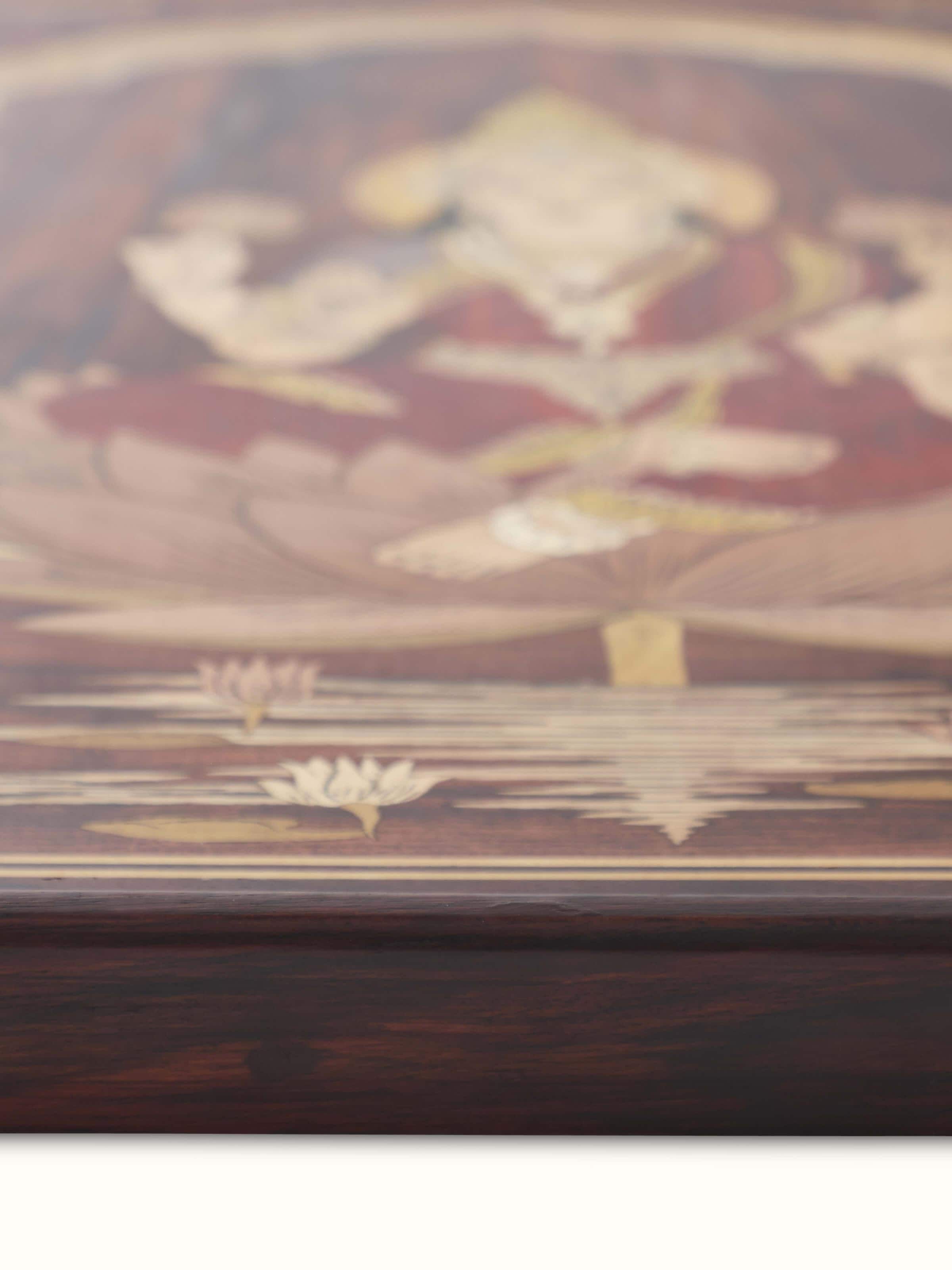 Angled view of Mysore rosewood inlaid Lakshmi wall art emphasizing the fine details and traditional craftsmanship