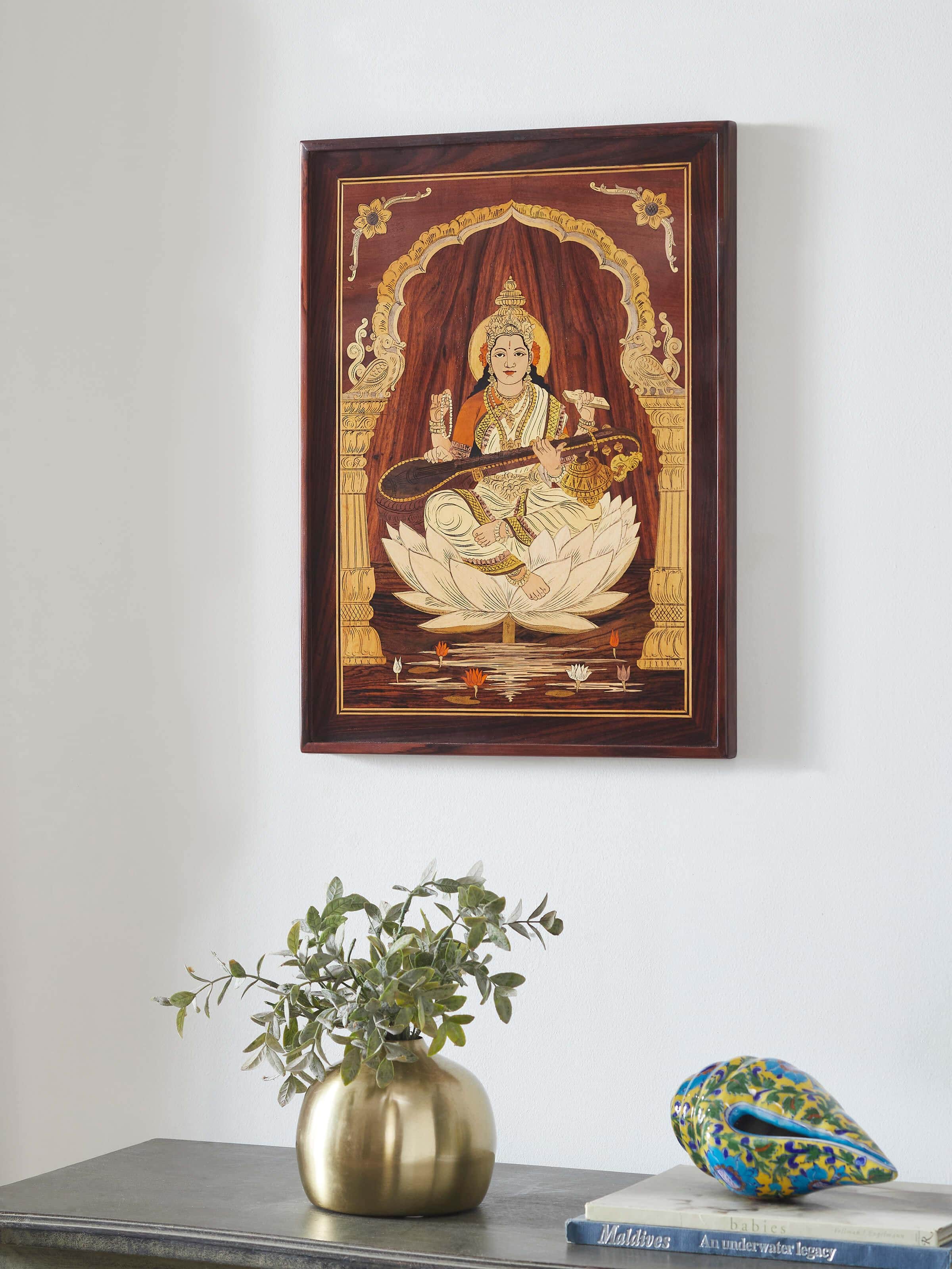 Side view of Mysore rosewood inlaid Saraswathi wall art emphasizing the intricate rosewood inlay and craftsmanship