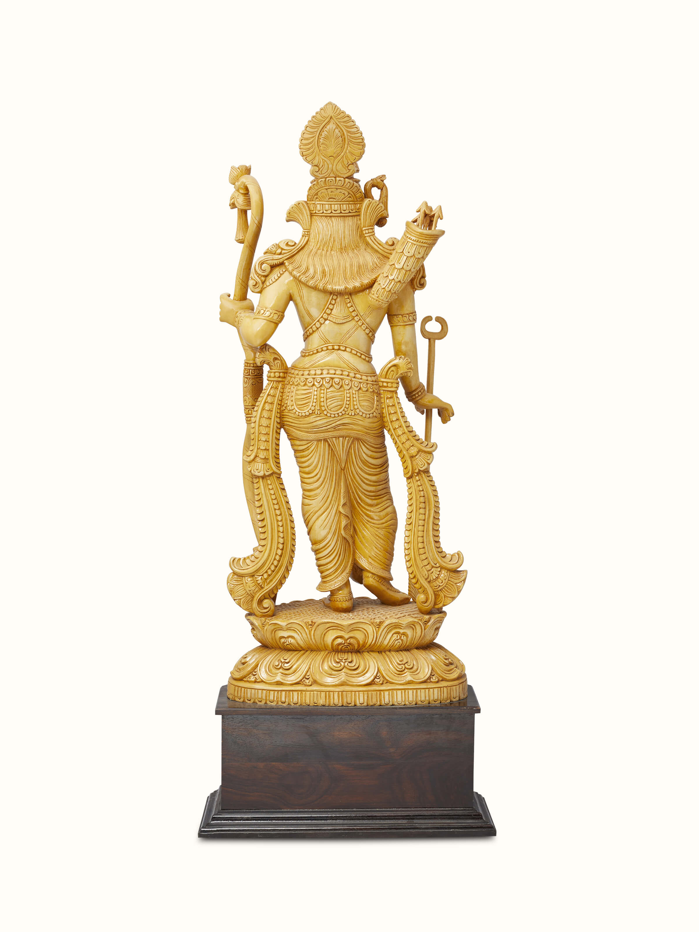 Back view of Jaitra carved Shivani wood ram idol displaying the wood grain and carving details