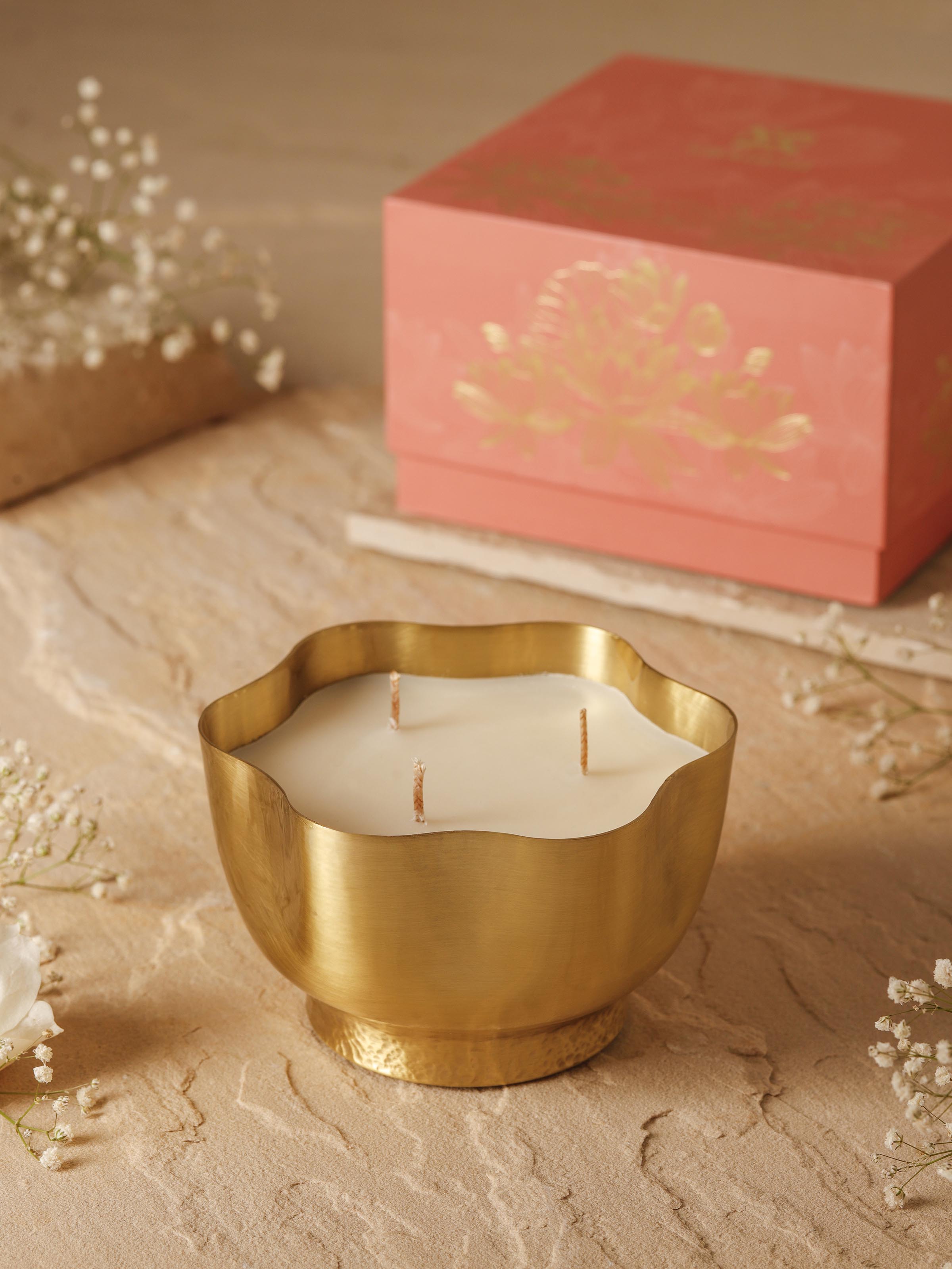 Side view of Leher Brass Candle highlighting the detailed craftsmanship and texture.