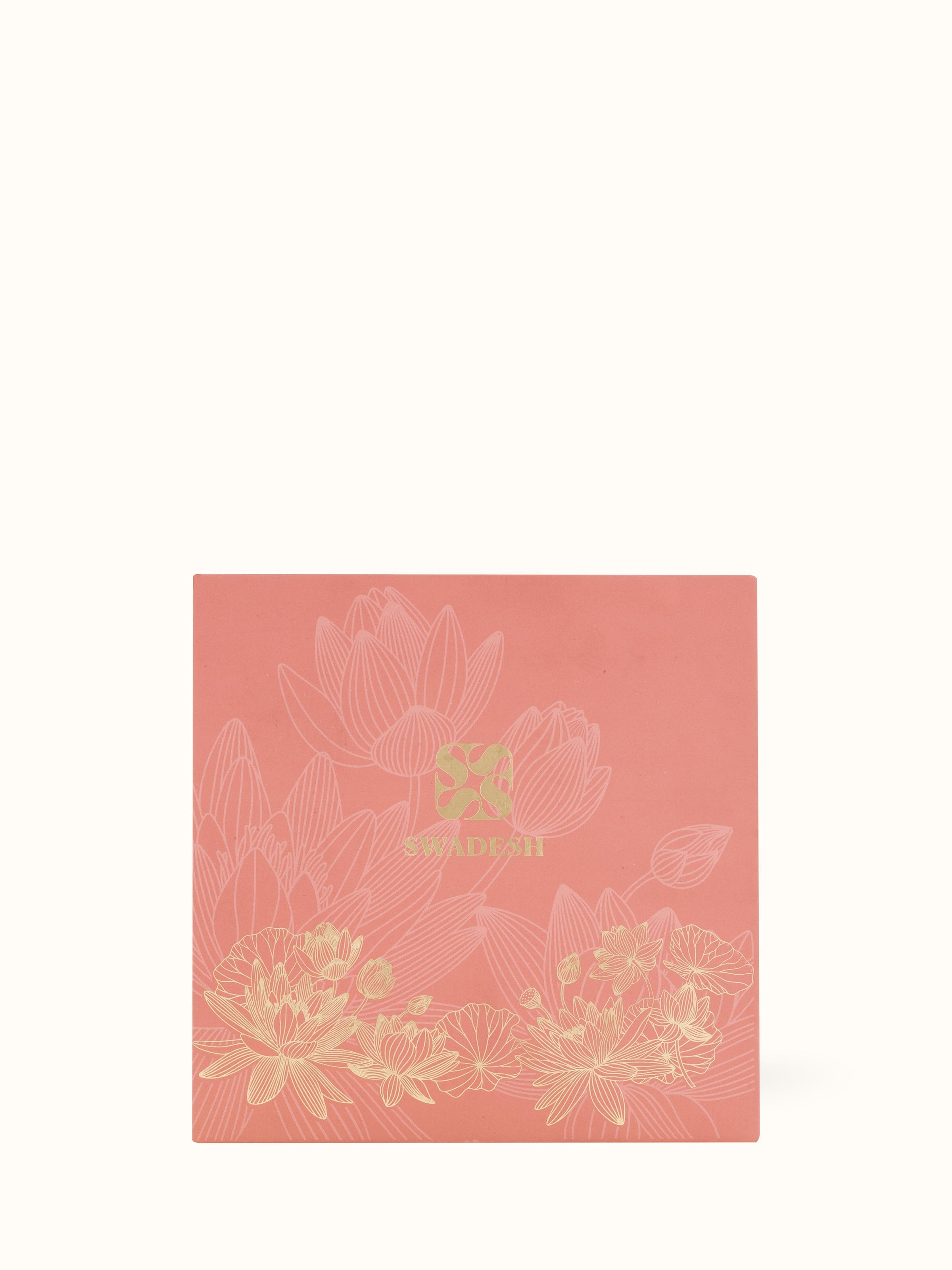 Overhead view of Leher Brass Candle emphasizing the candle's shape and brass texture.