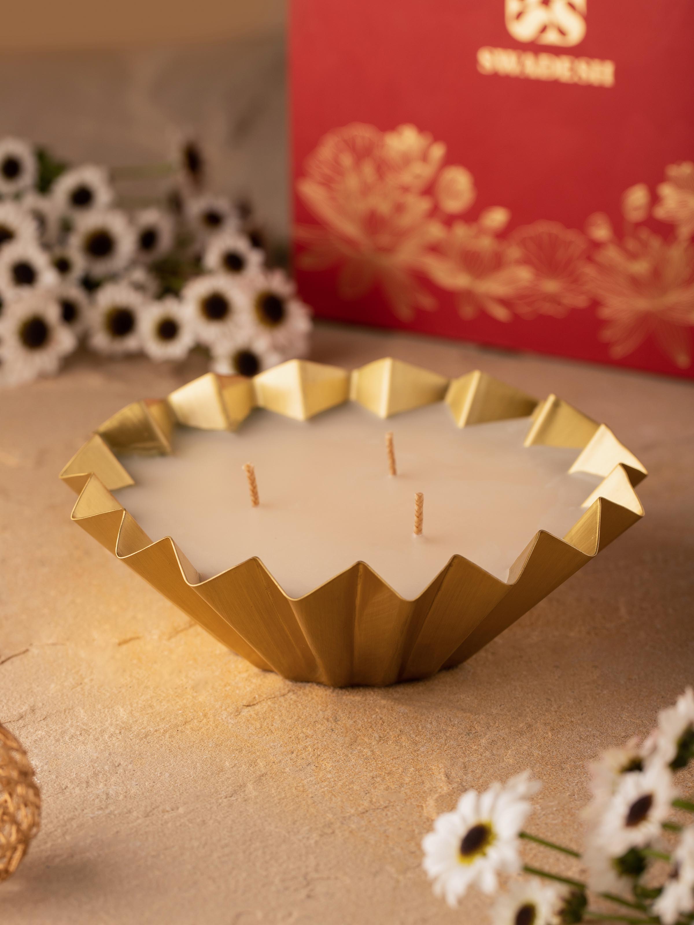 Side view of Vanilla Brass Candle highlighting the intricate details of the brass finish