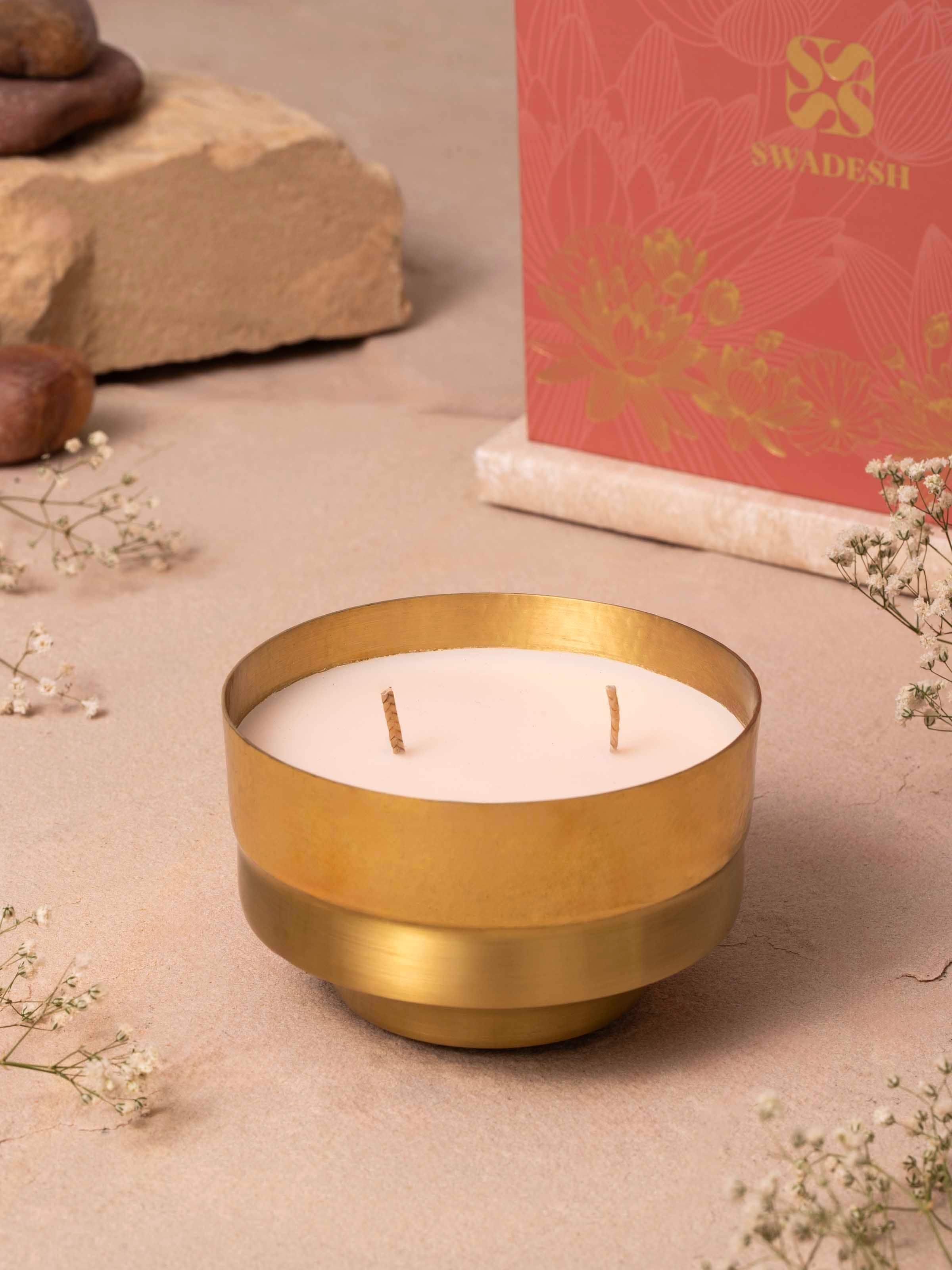 Close-up of Neroli Brass Candle showcasing the texture of the brass and candle flame