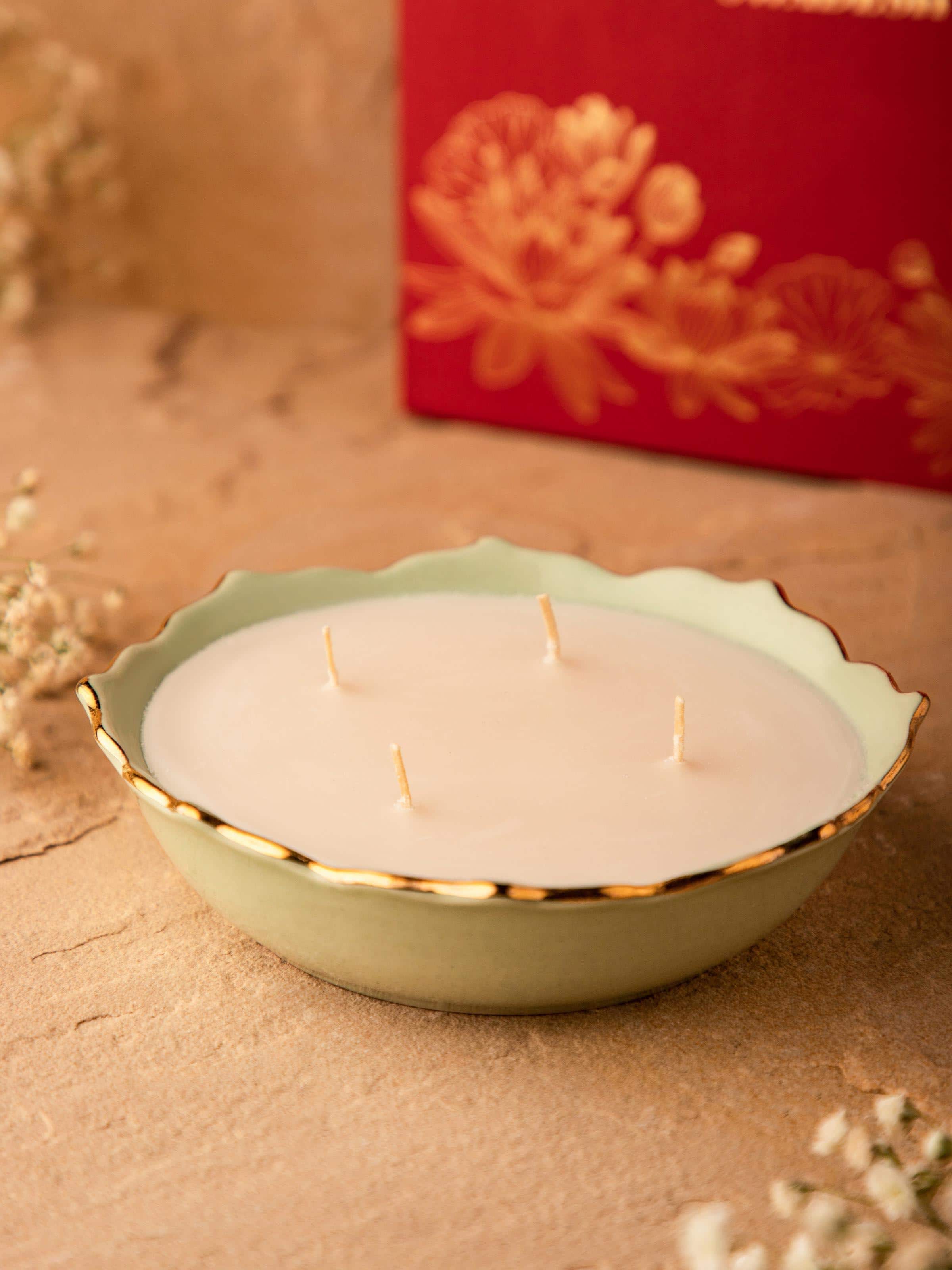 Side view of Green Ceramic Candle highlighting the unique ceramic texture and candle wick