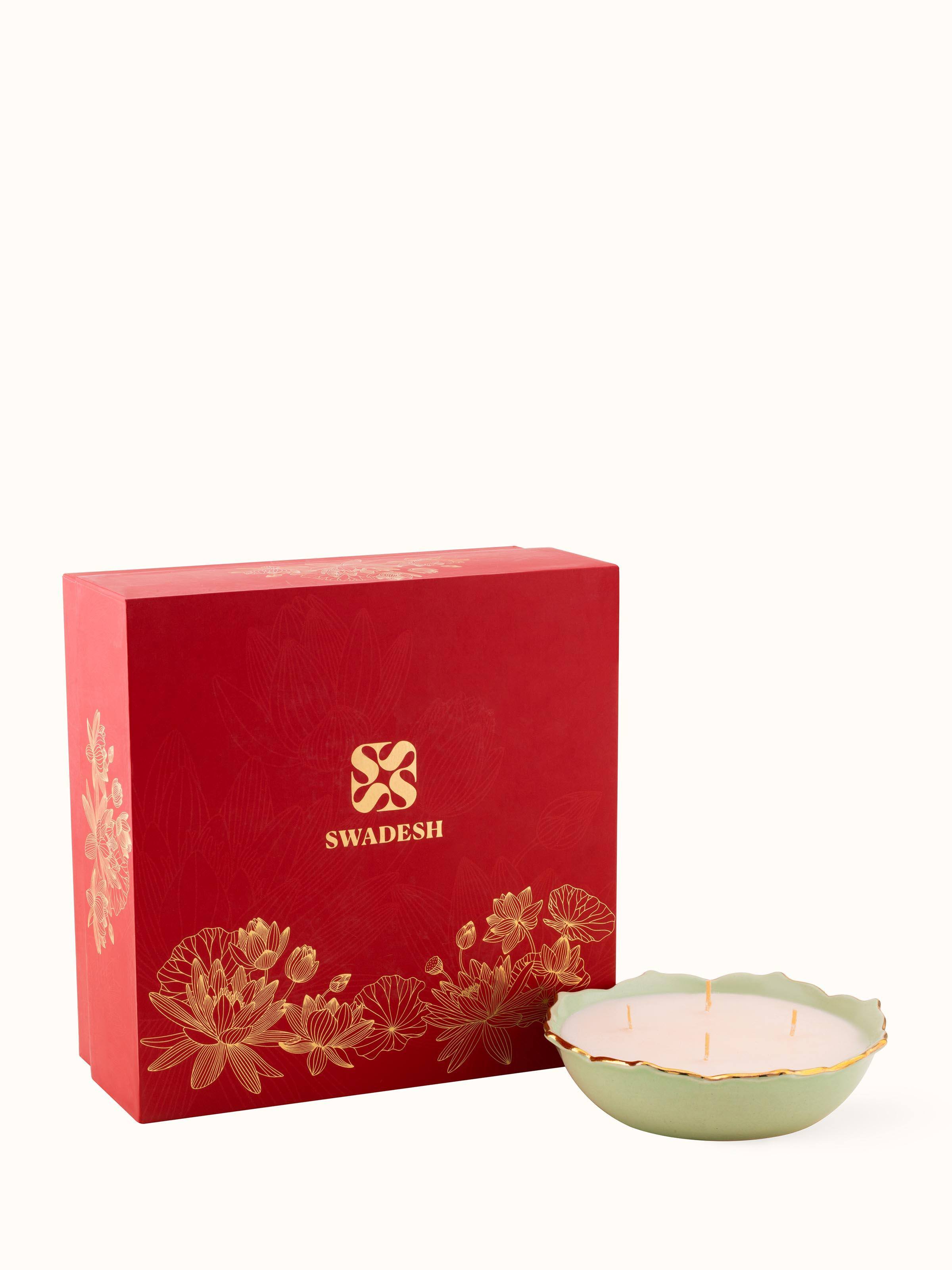 Green Ceramic Candle displayed in a cozy setting, enhancing its ambiance and decorative appeal