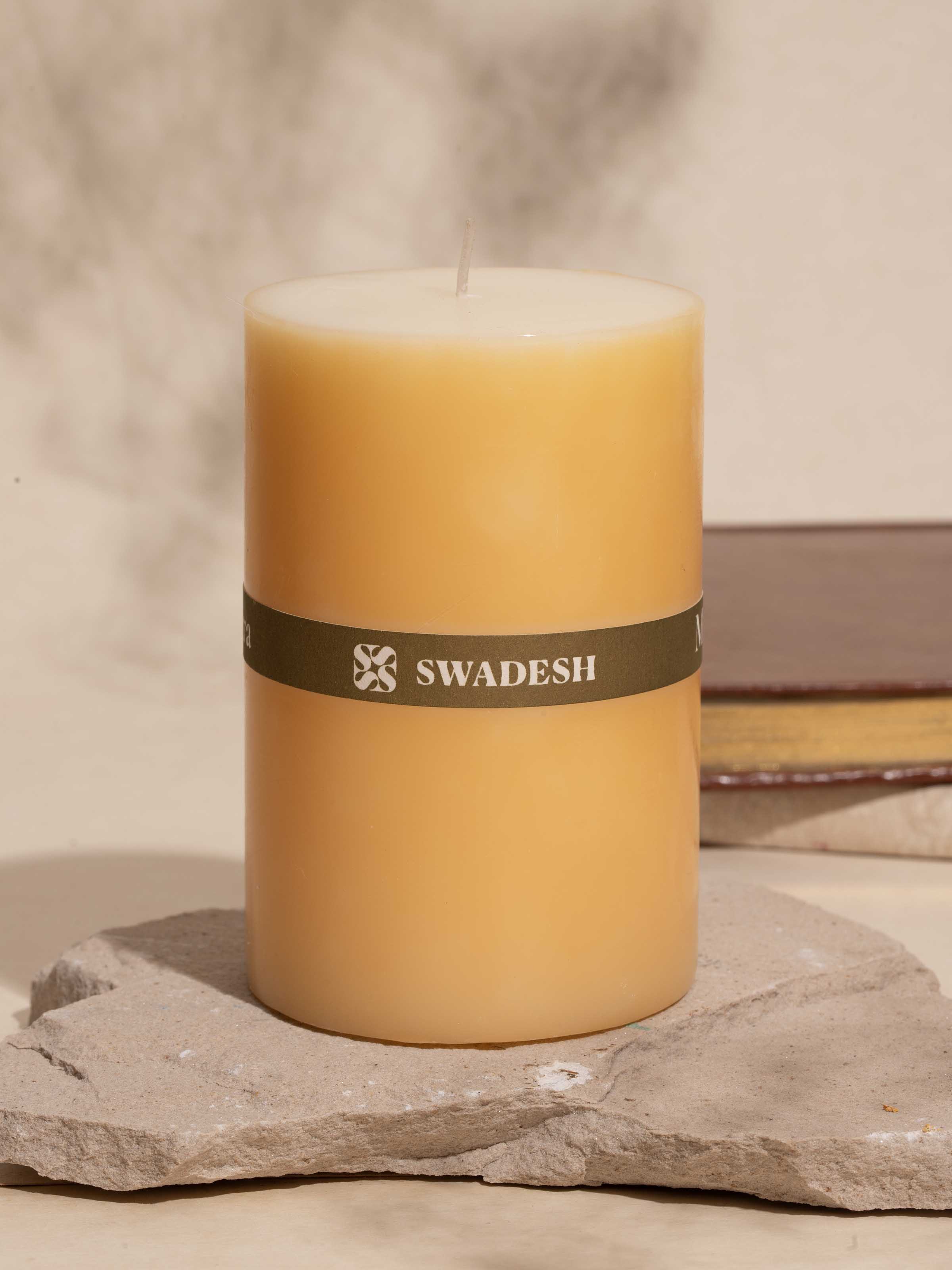 Close-up of Mogra pillar candle (4.5 inches) highlighting its intricate floral texture.