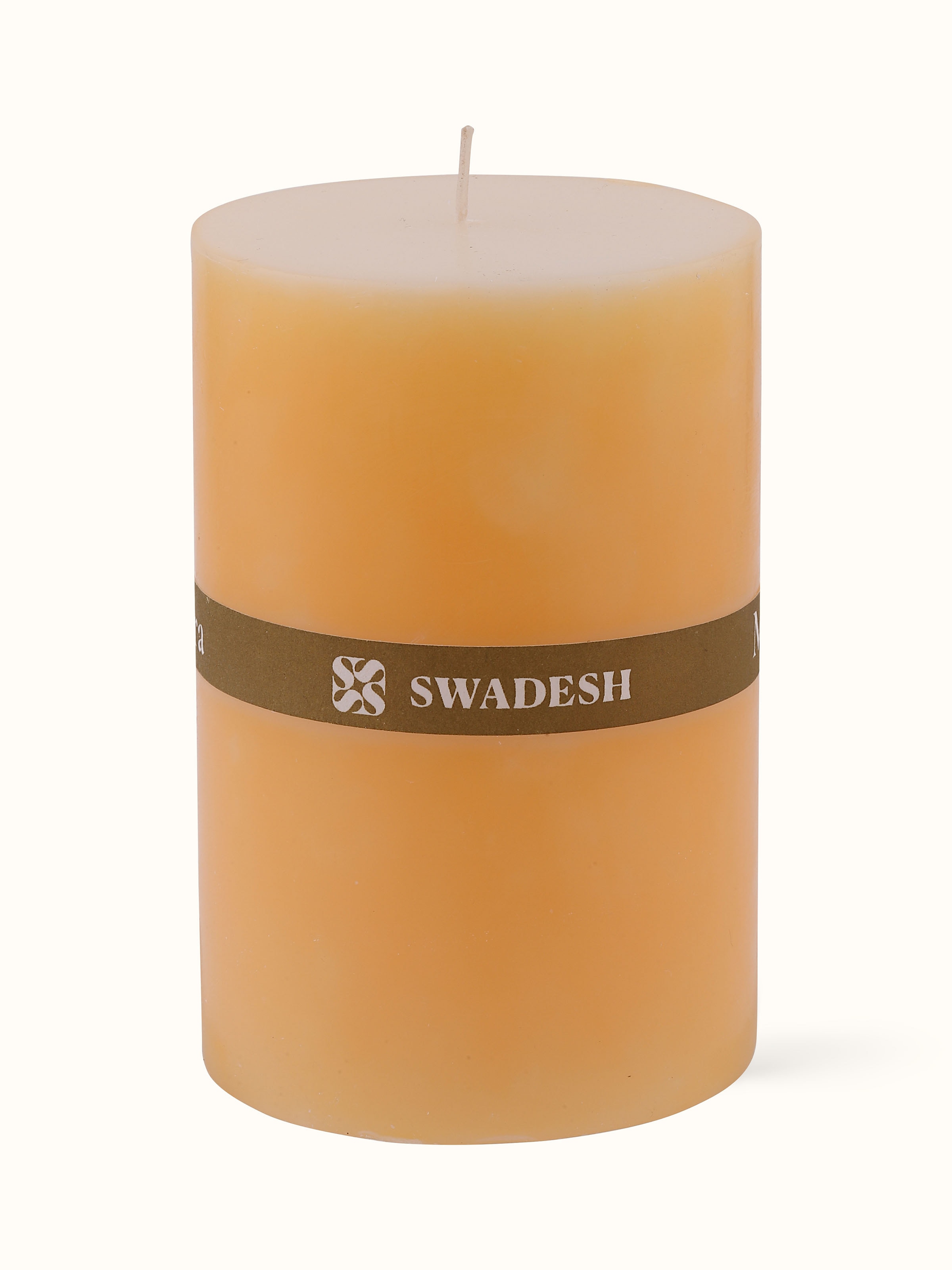 Side view of Mogra pillar candle (4.5 inches) revealing its elegant floral design.