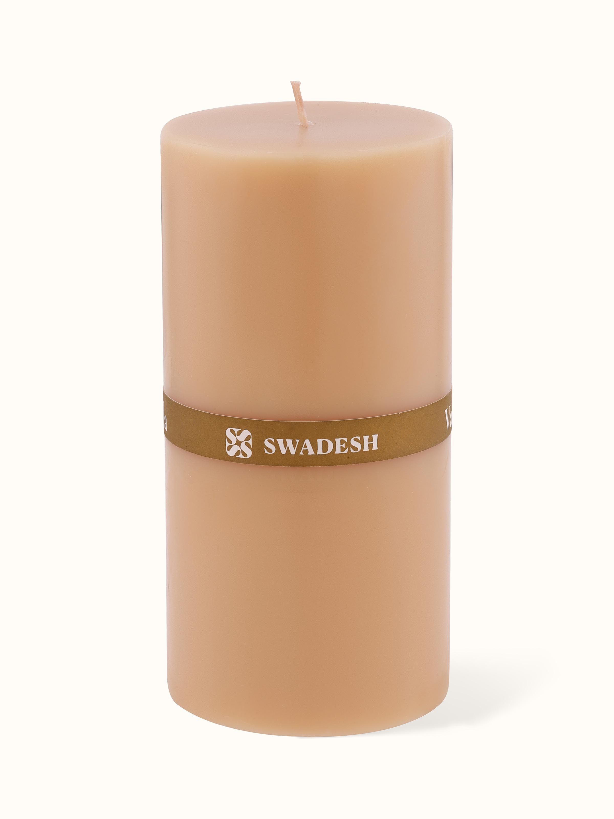Angled view of Vanilla Pillar Candle (6 inches) emphasizing the candle's height and shape.