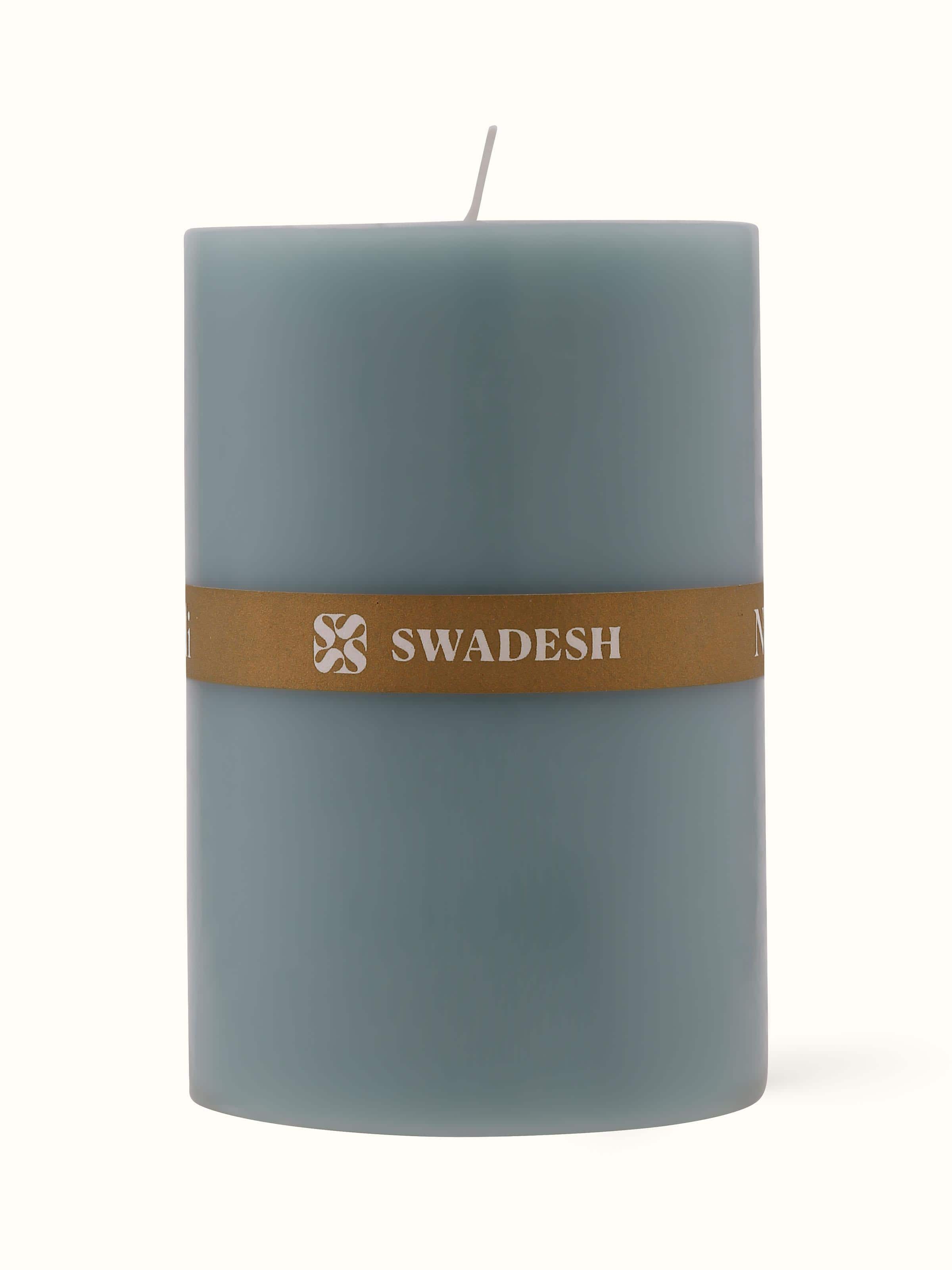 Front view of Neroli Pillar Candle showcasing its vibrant color and unique design