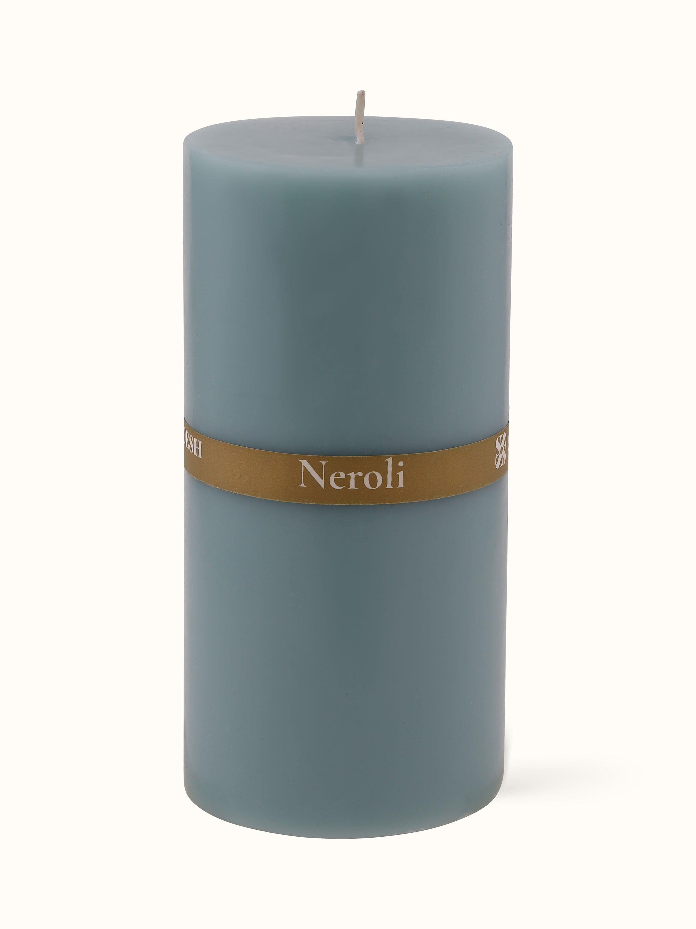 Back view of Neroli Pillar Candle revealing branding and scent information