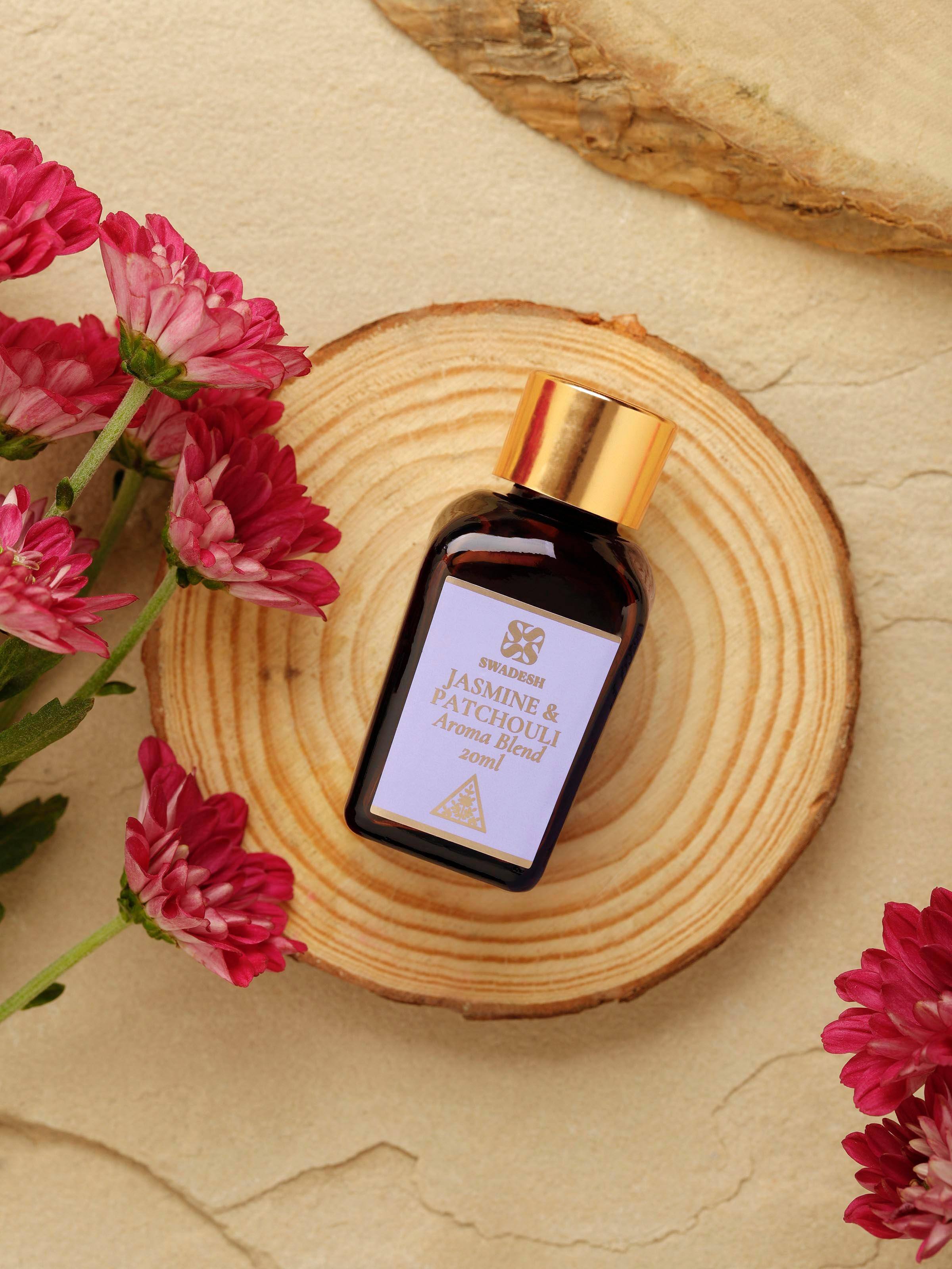 Close-up of Aroma Blend Jasmine & Patchouli, highlighting the elegant bottle design.