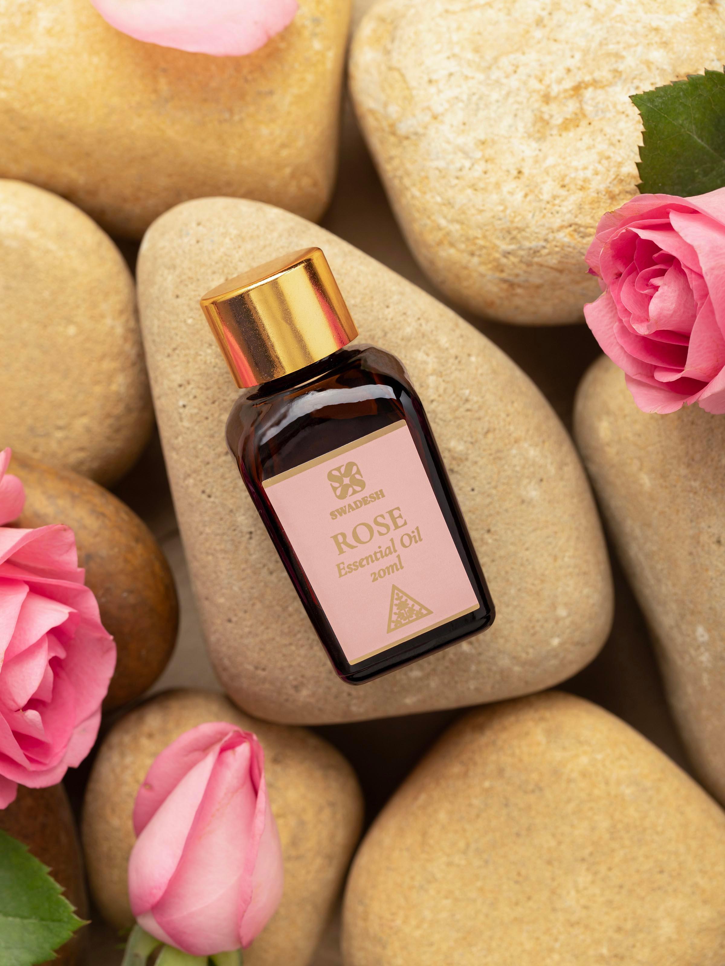 Close-up of Essential Oil Rose focusing on the dropper and product details