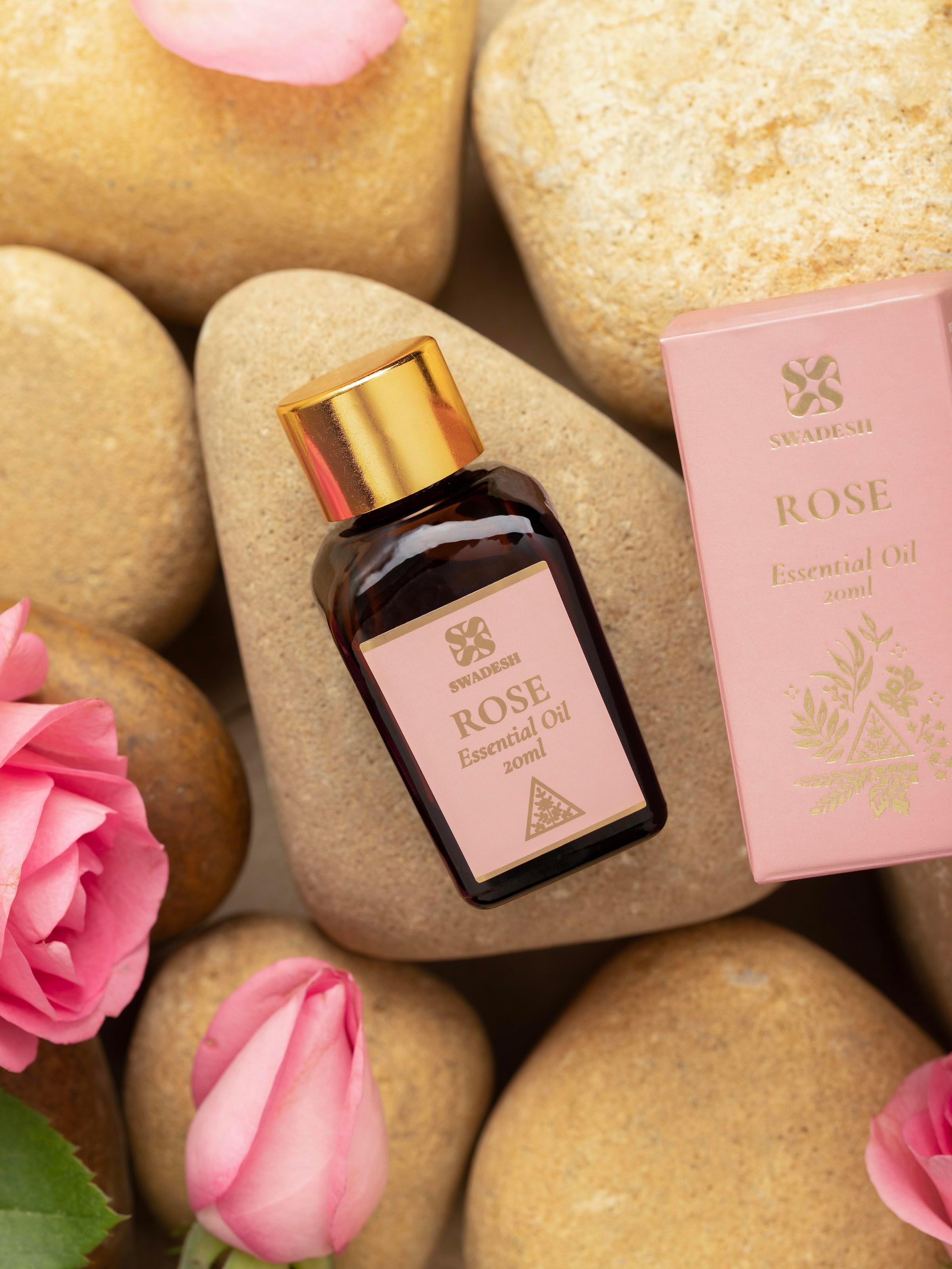 Side view of Essential Oil Rose showcasing the elegant bottle shape and label