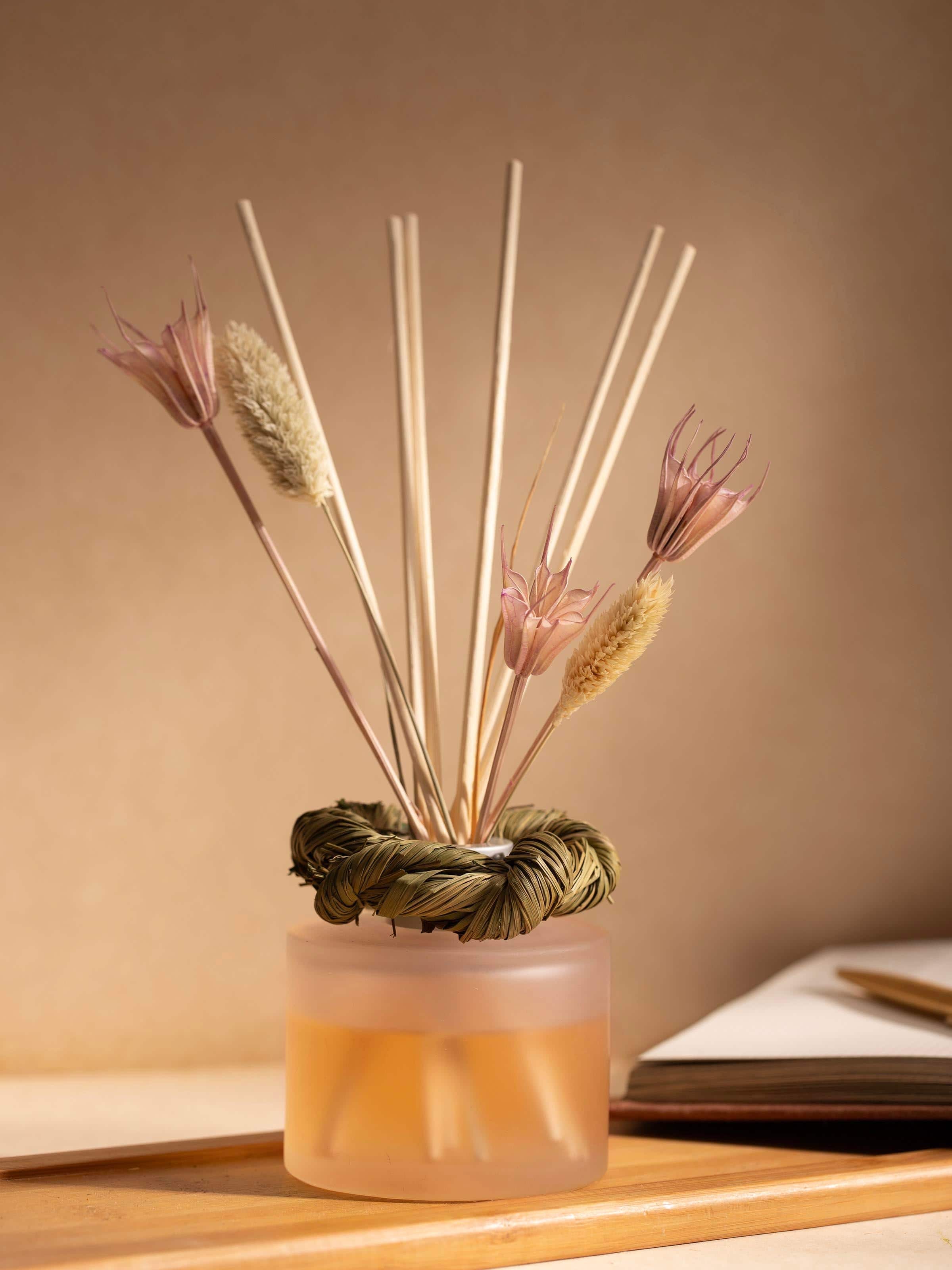 Close-up of Lavender aroma reed diffuser showing the bottle design and lavender essence.