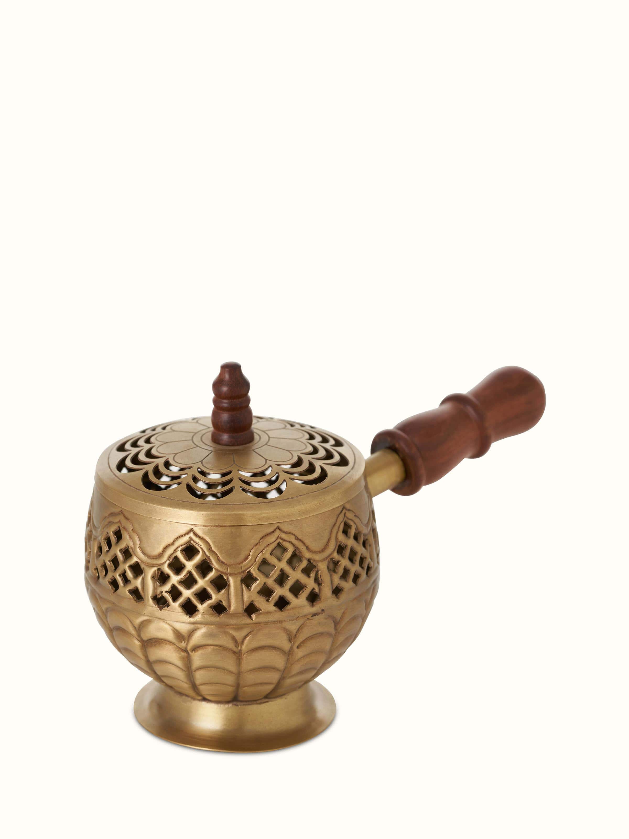 Front view of Polished Brass Dhuna highlighting its gleaming surface and traditional design.