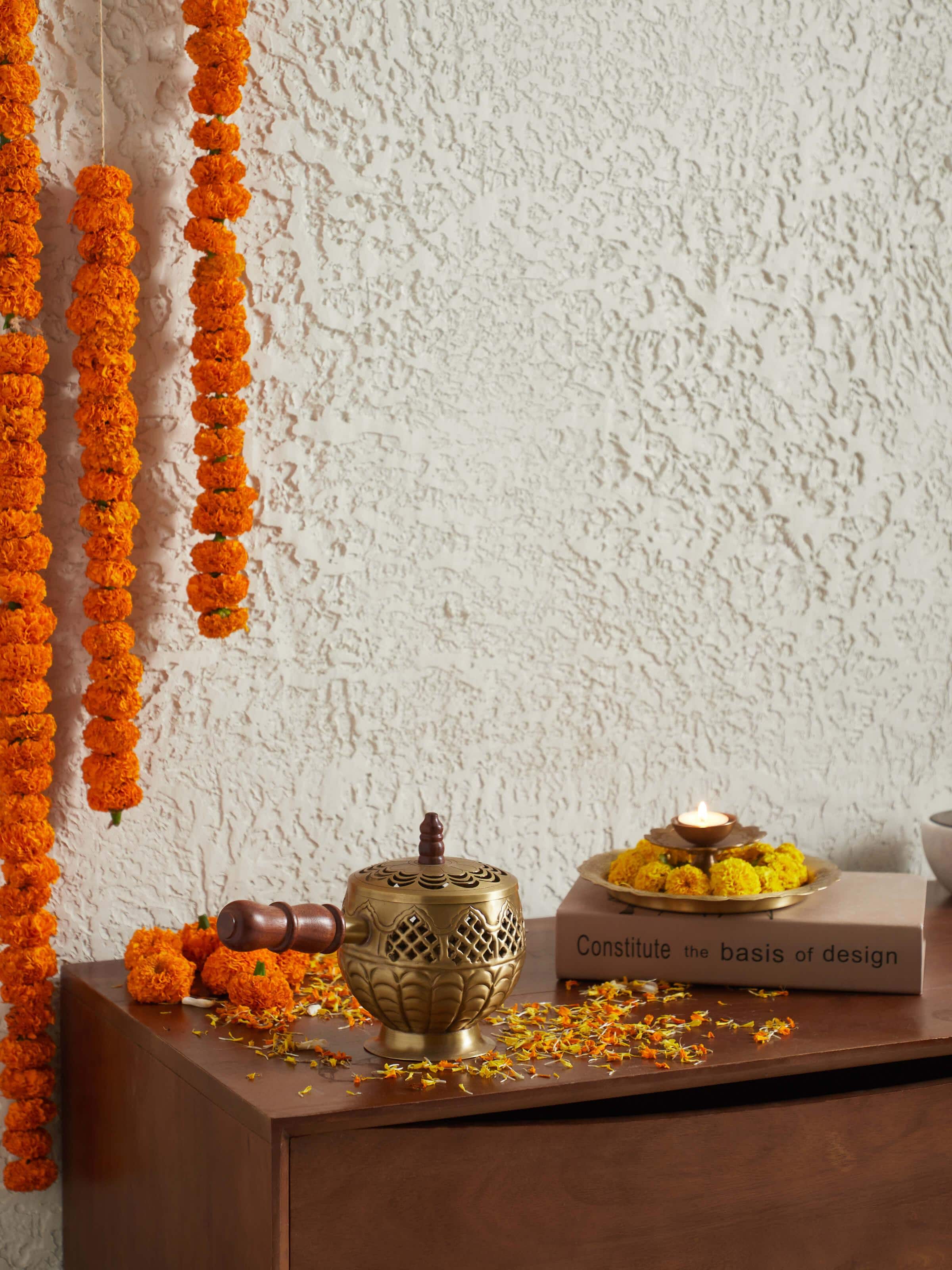 Side view of Polished Brass Dhuna showcasing its detailed craftsmanship and polished finish.