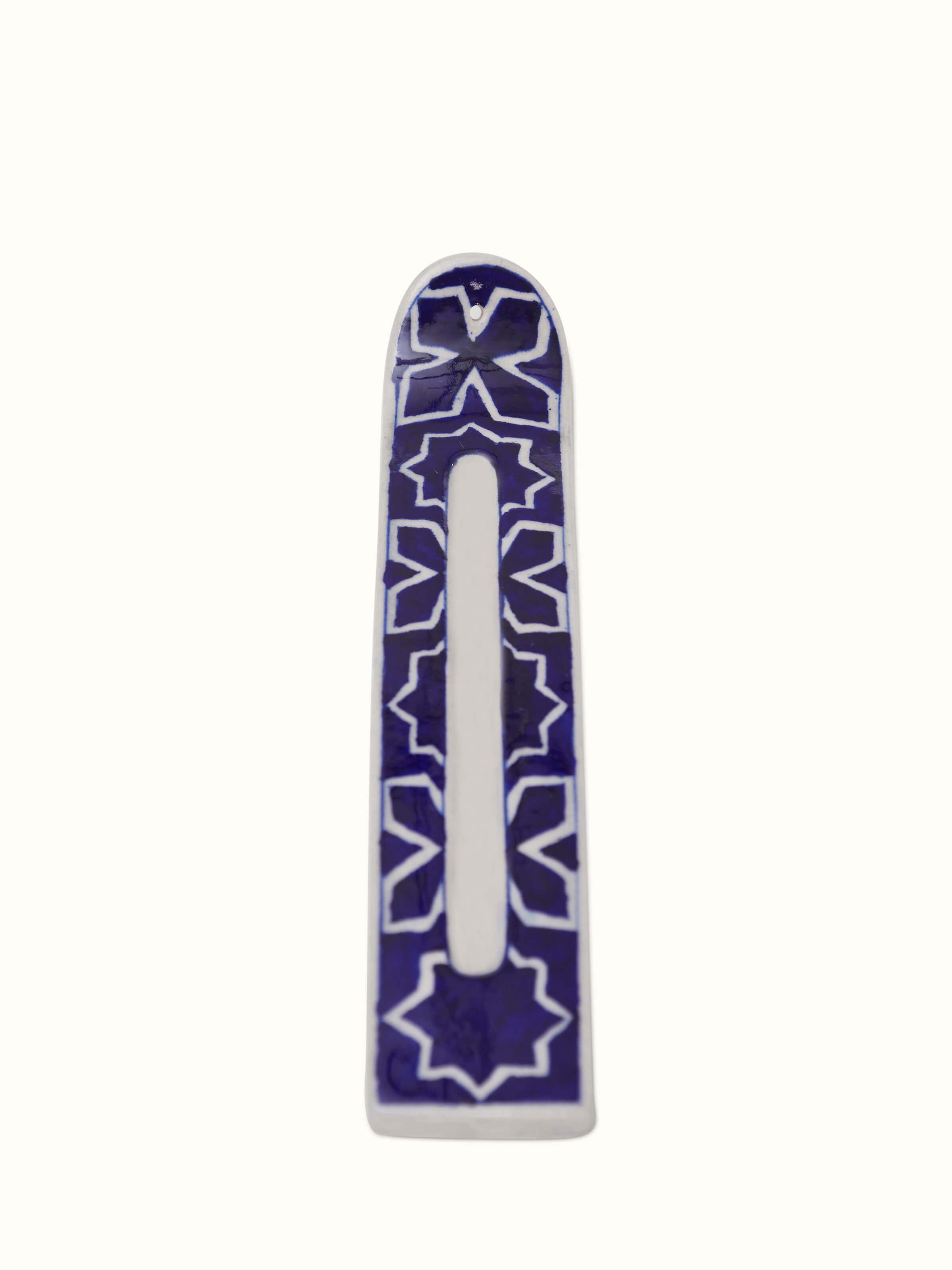Front view of Blue Pottery Stoneware Rectangular Incense Holder highlighting vibrant design.
