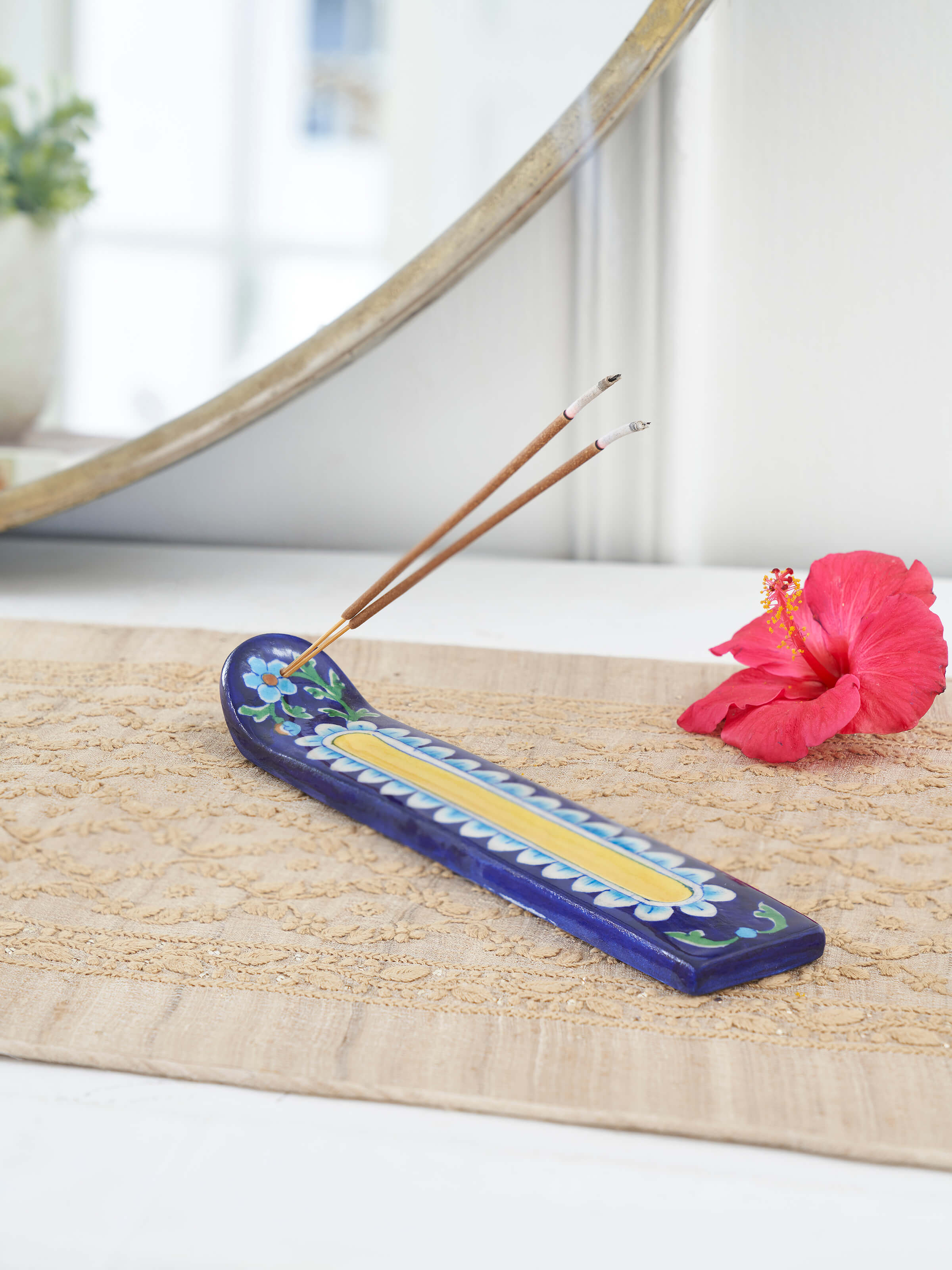 Side view of Polished Blue Pottery Stoneware incense holder highlighting the elegant design and detailed craftsmanship