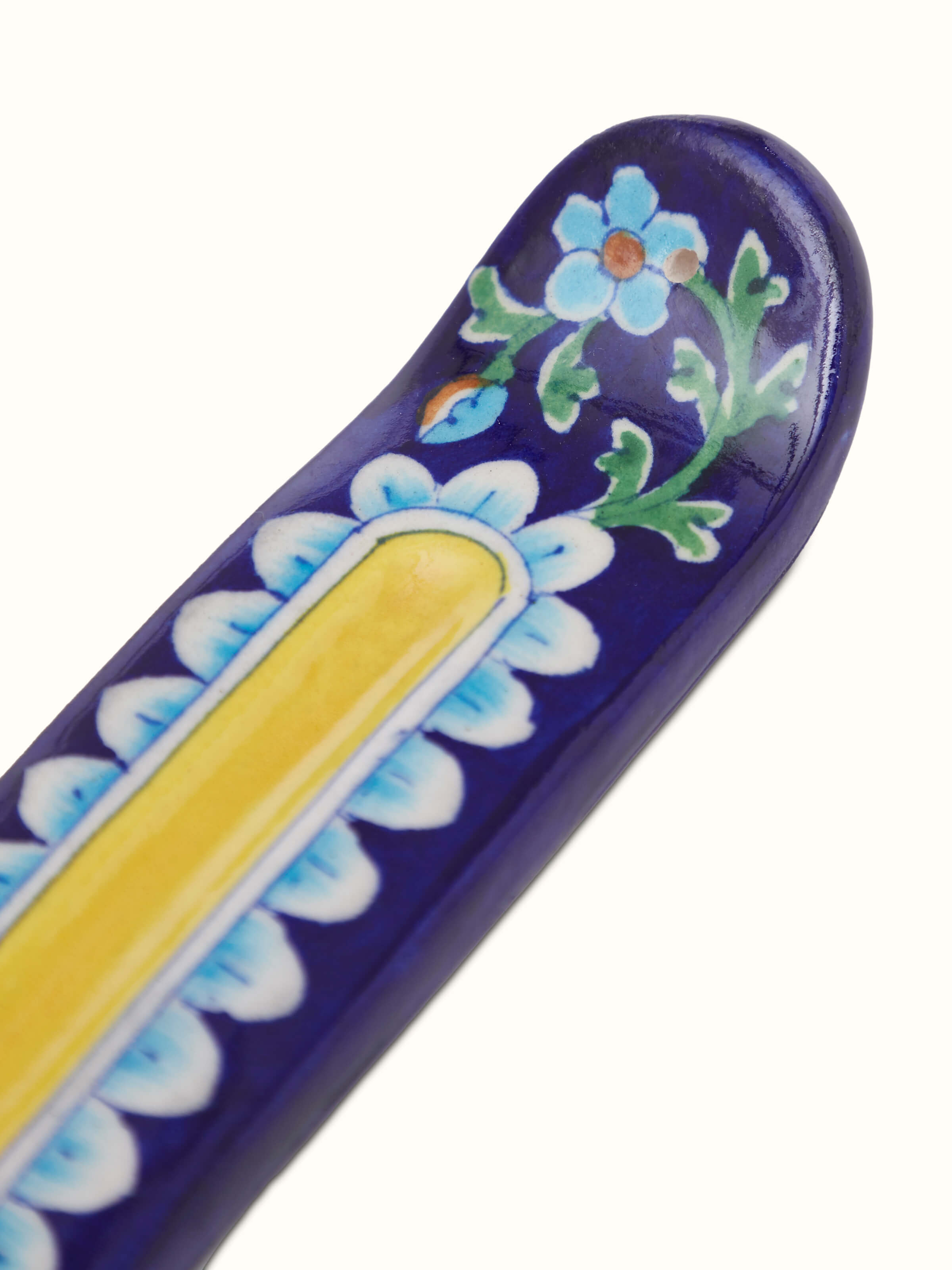 Close-up of Polished Blue Pottery Stoneware incense holder showing the vibrant blue glaze and fine detailing
