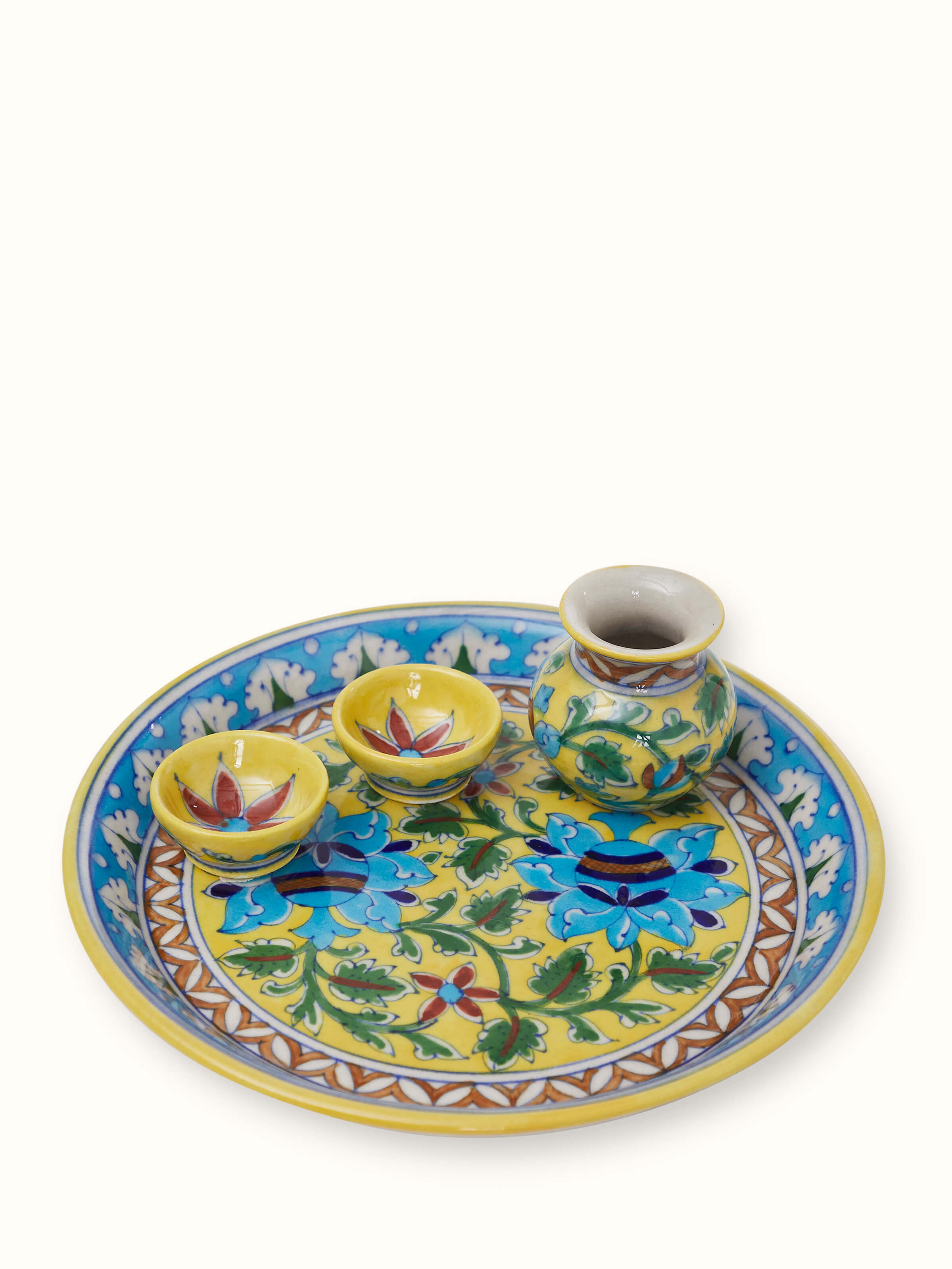 Detailed view of polished blue pottery stoneware pooja thali set, showcasing the craftsmanship and vibrant blue glaze.