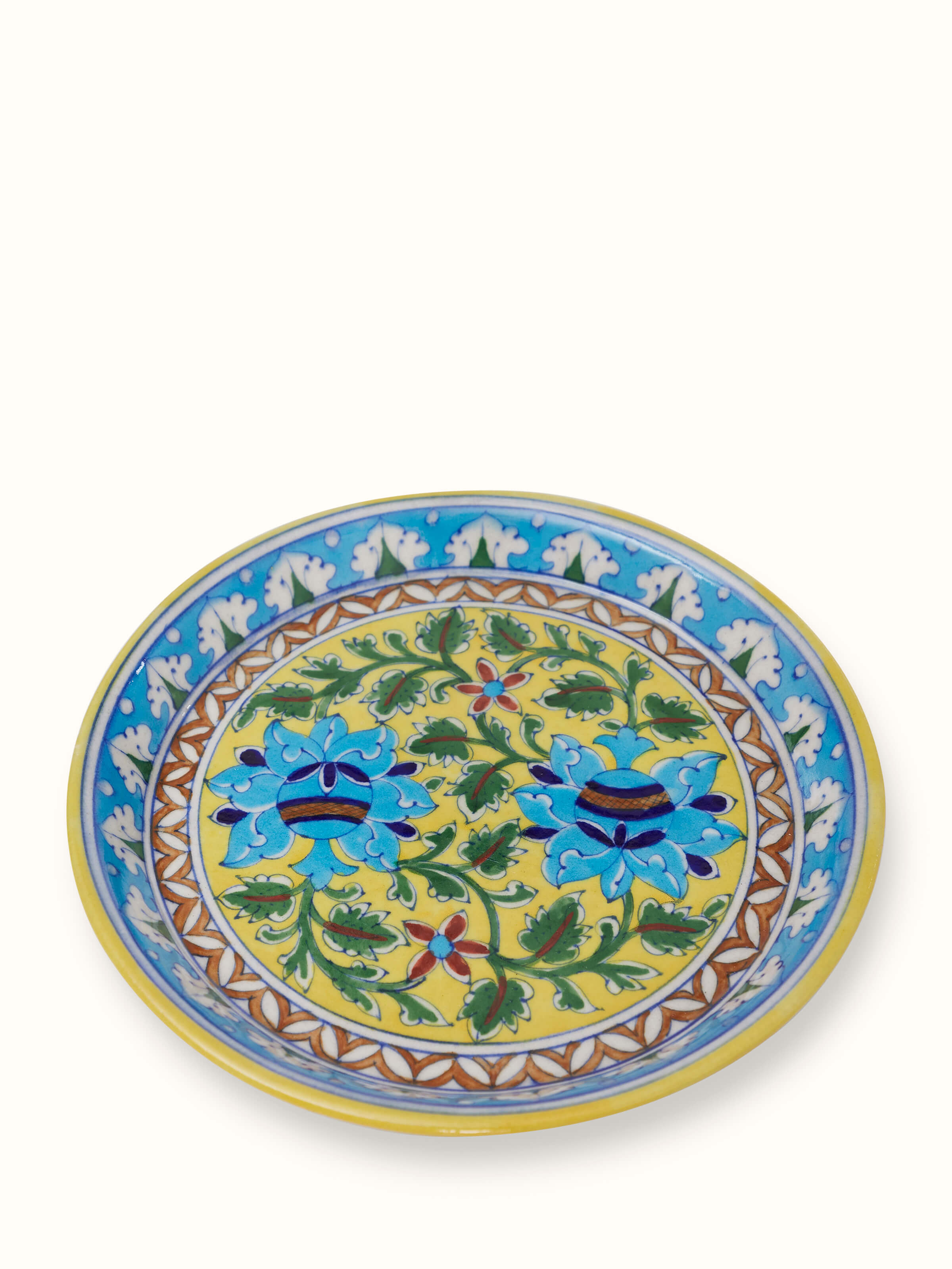 Front view of polished blue pottery stoneware pooja thali set, emphasizing the traditional design and blue color.
