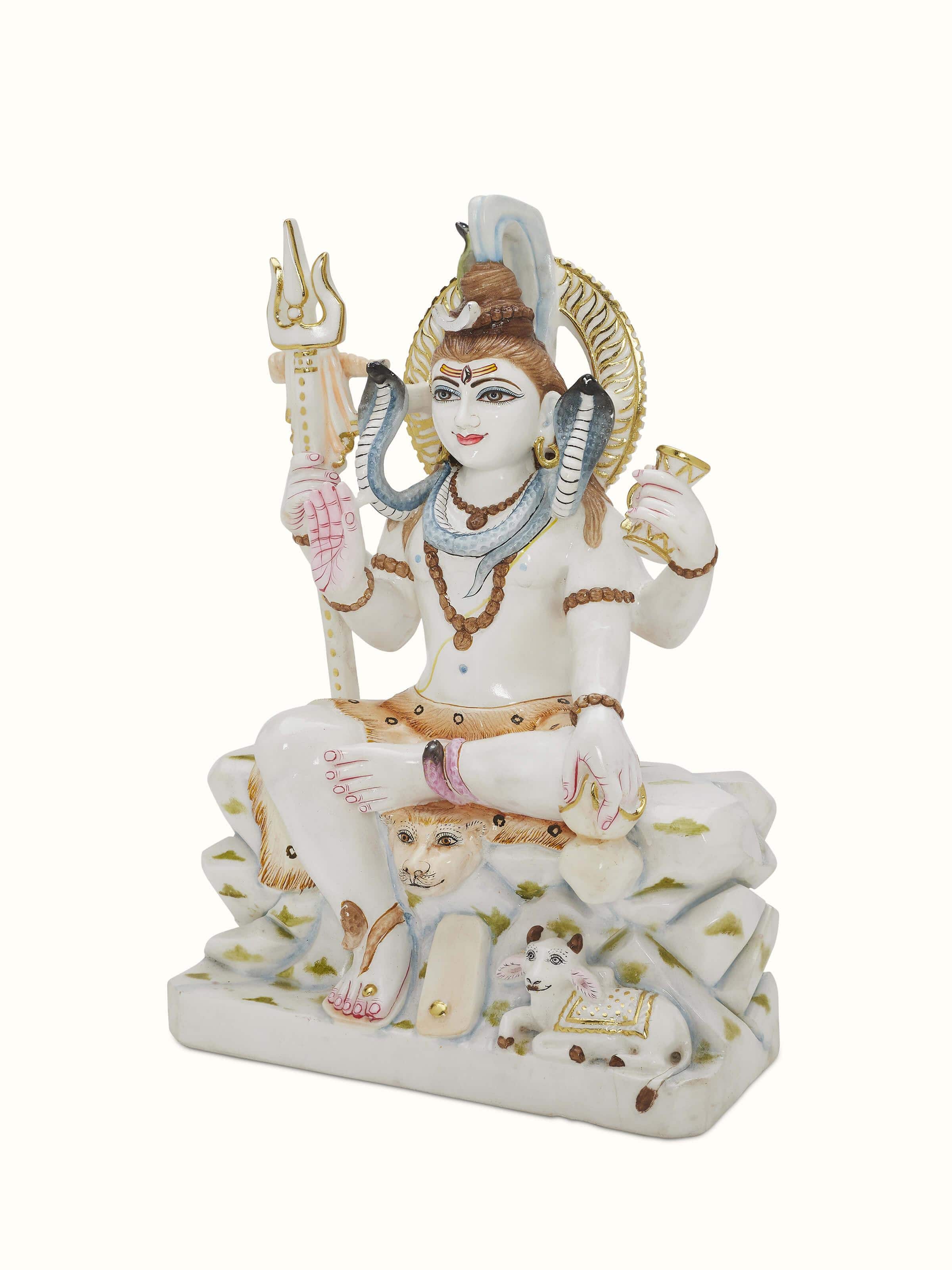 Side view of Carved Marble Shiva Idol highlighting the marble details and carved features.