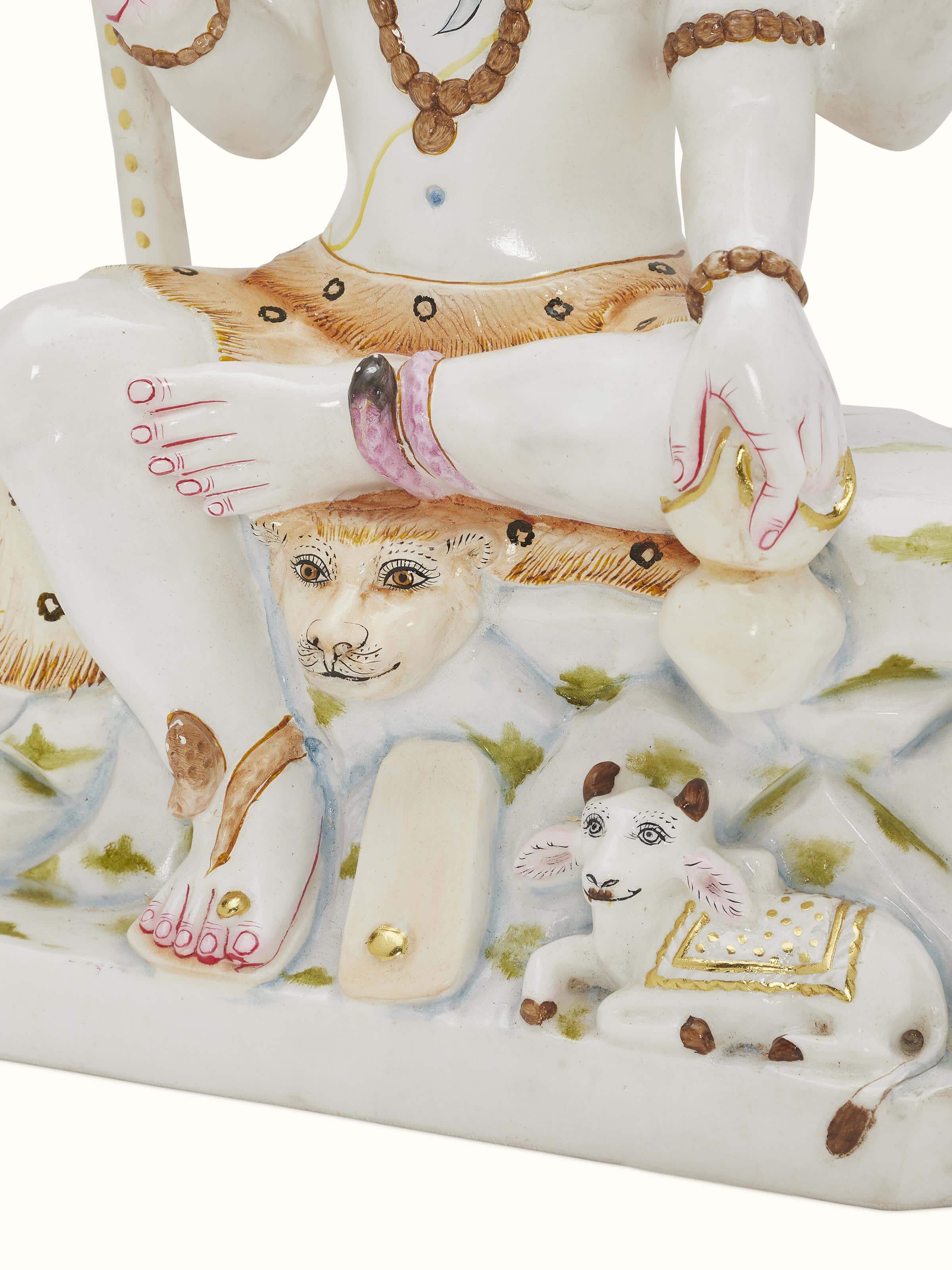 Close-up detail of Carved Marble Shiva Idol focusing on the fine carving and marble texture.