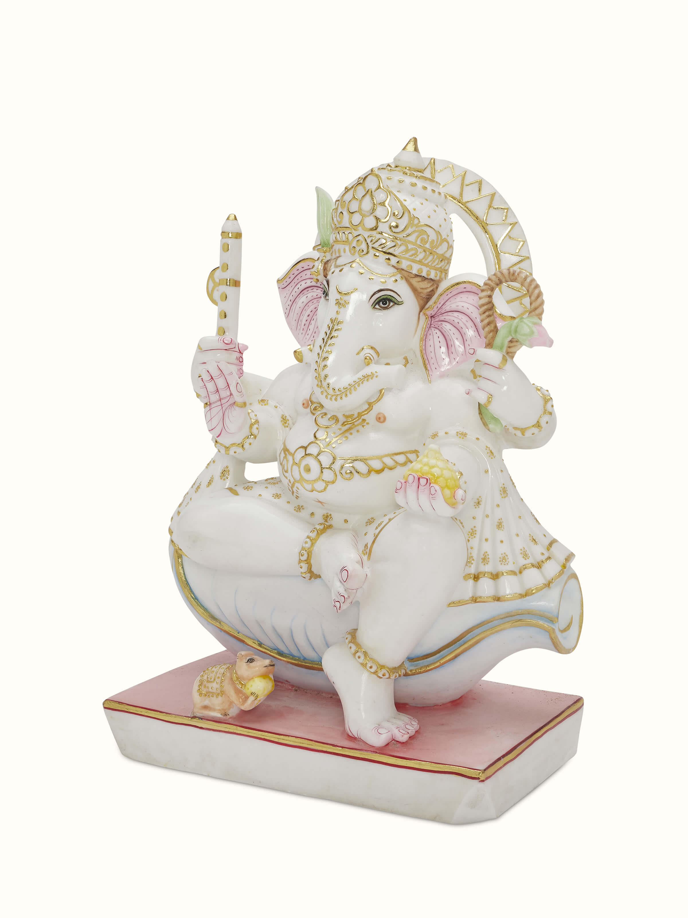 Side view of carved marble Ganesha idol.
