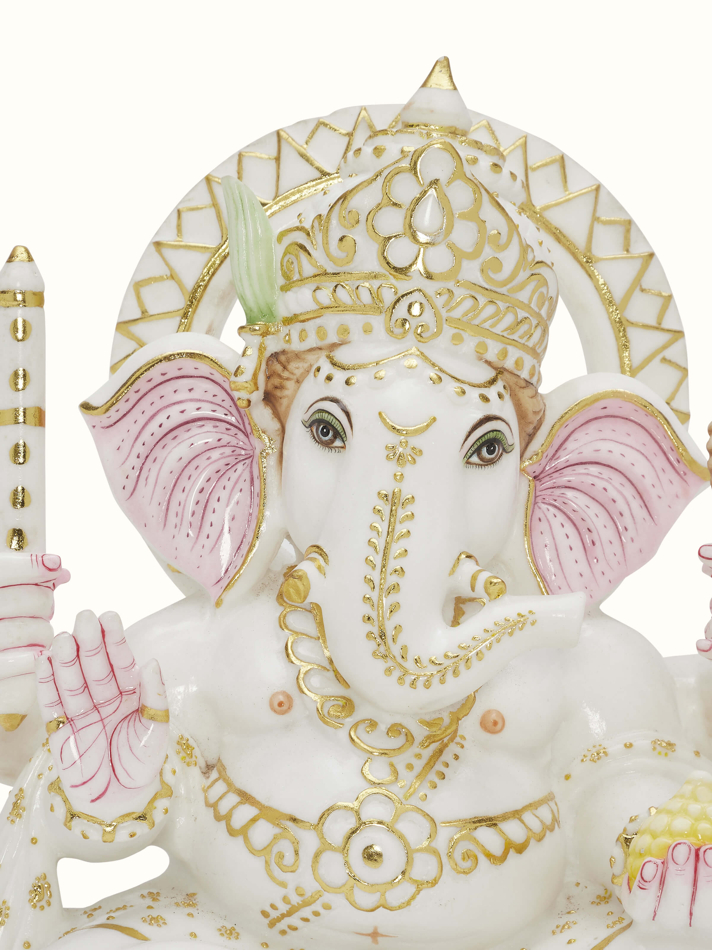 Close-up view of carved marble Ganesha idol.