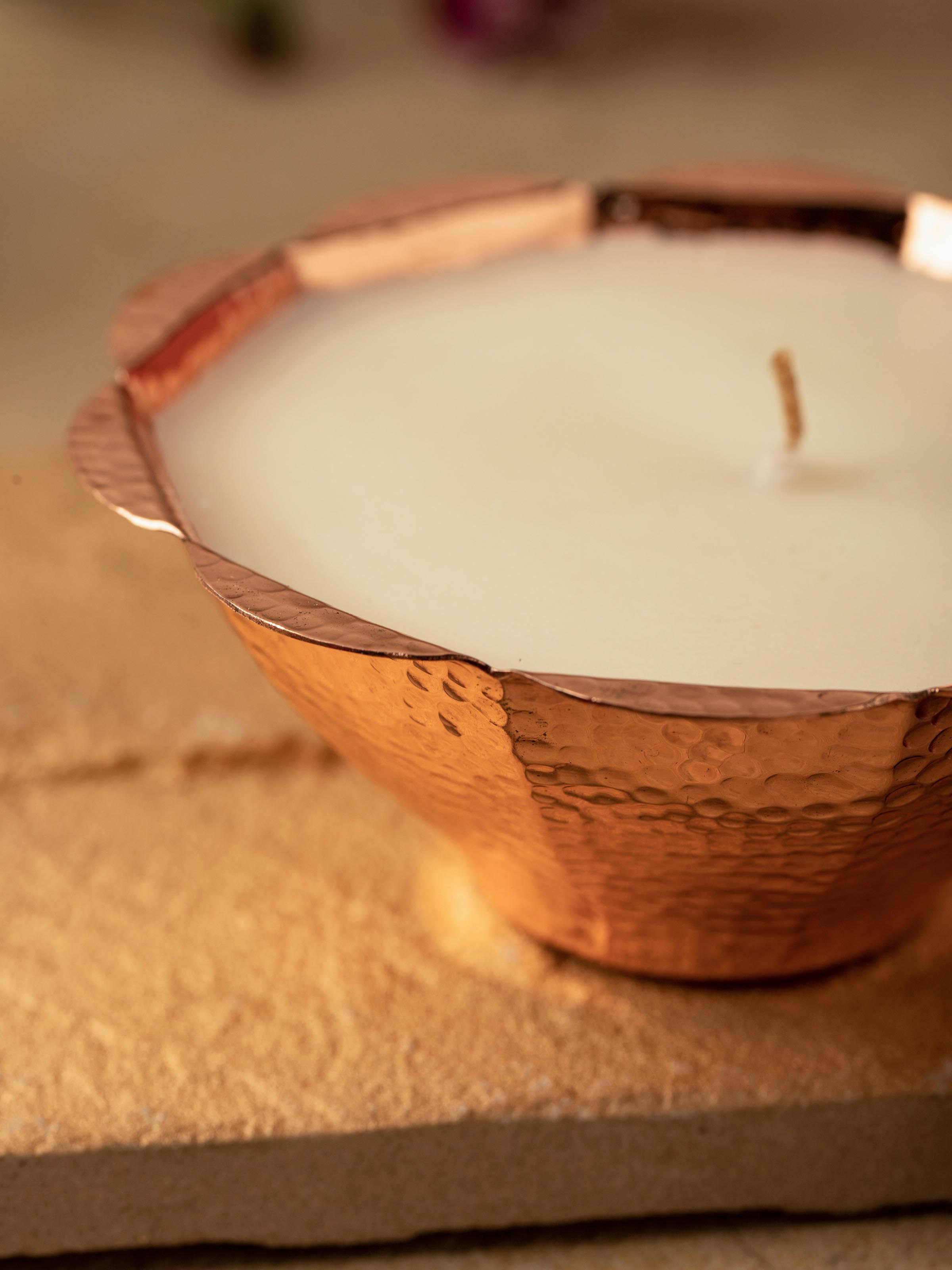 Detailed view of Mogra Copper Candle emphasizing the elegant texture and design