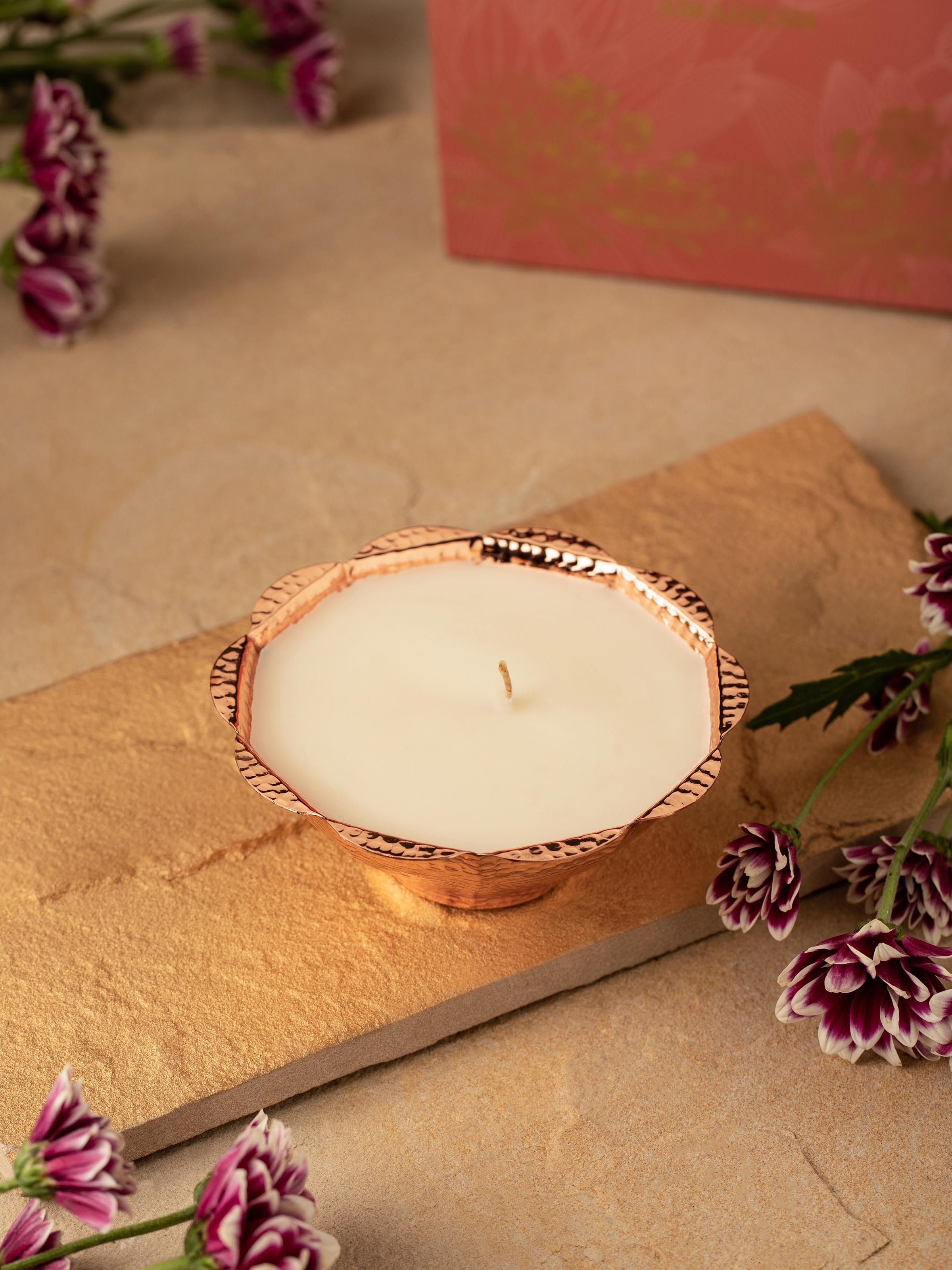 Close-up of Mogra Copper Candle highlighting the intricate details and finish