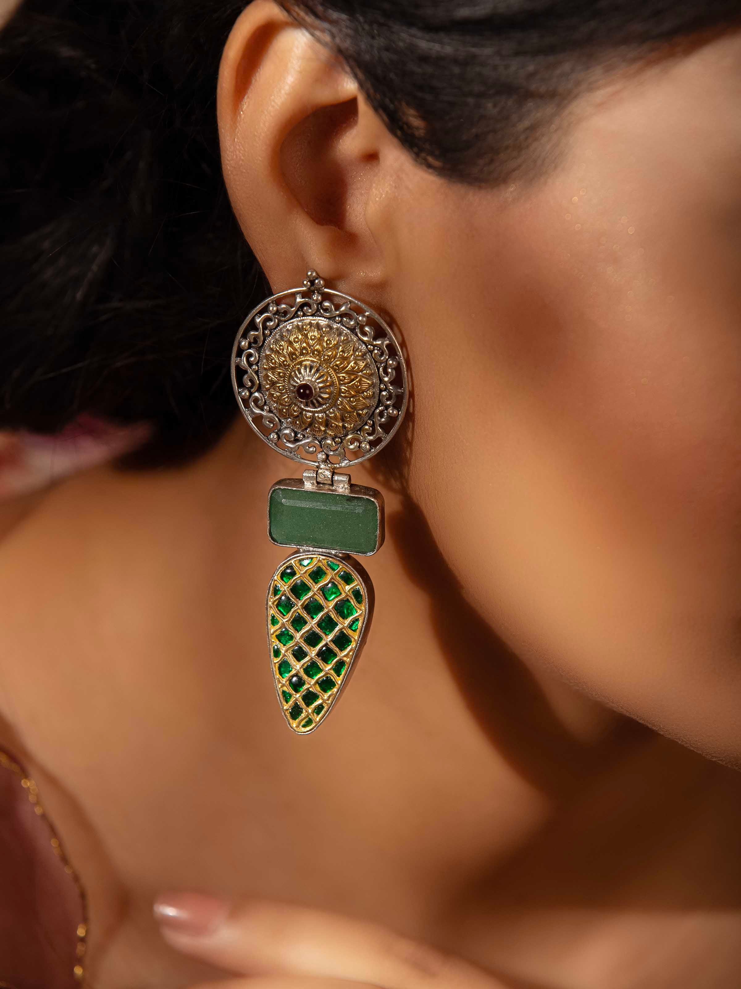 Side view of Silver Smithing Drop Earrings illustrating detailed design and craftsmanship.