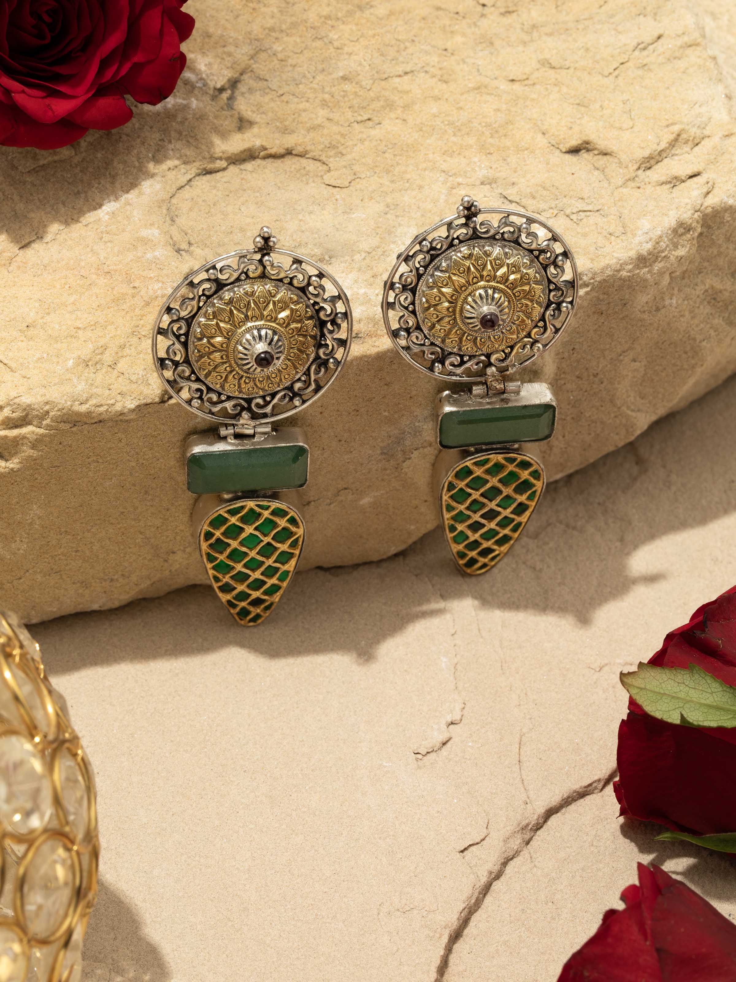 Angled view of Silver Smithing Drop Earrings showcasing the elegant drop design and intricate details.