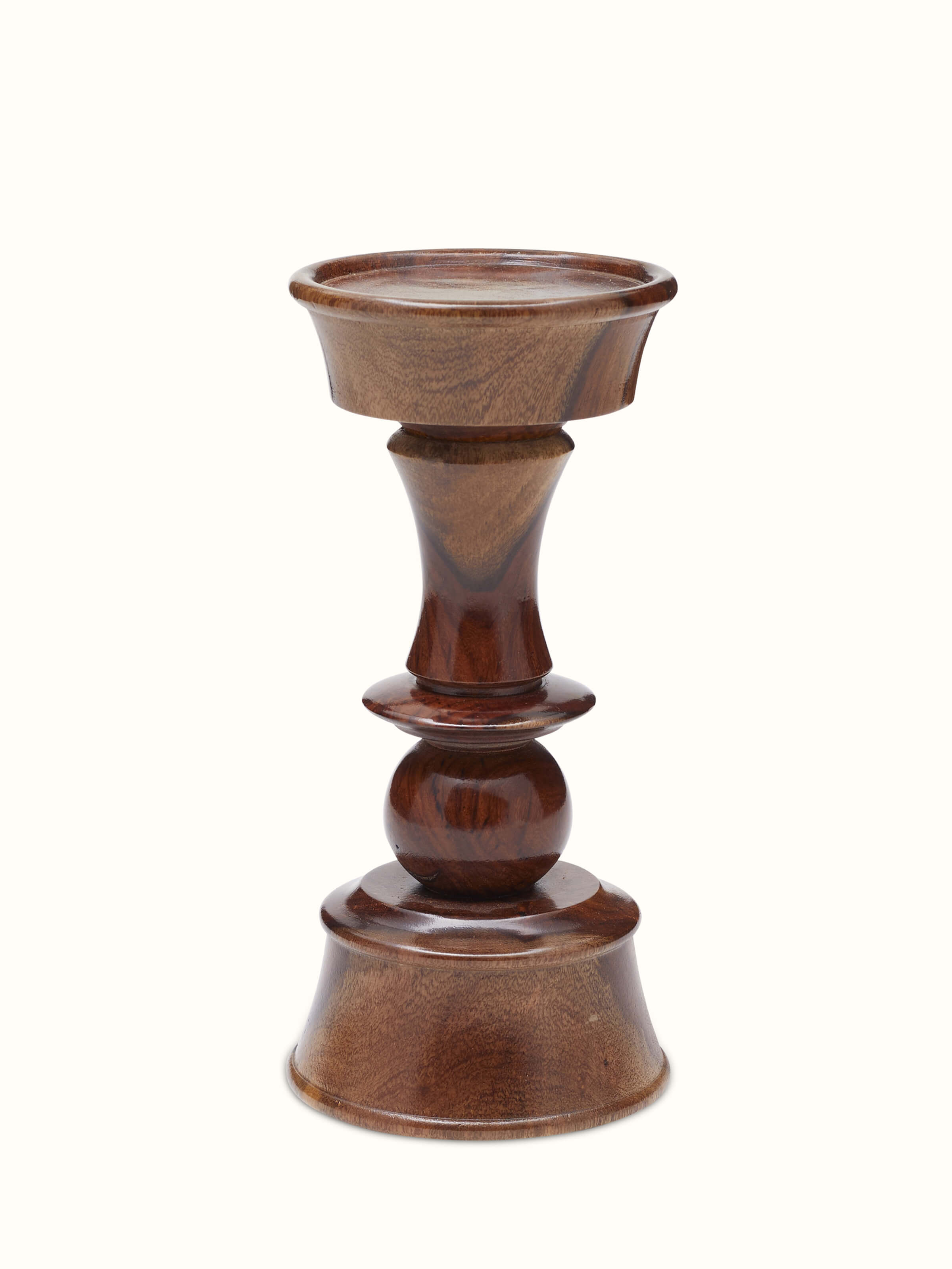 Side view of Natural Sheesham wood candle holder highlighting its classic shape and rich wood texture