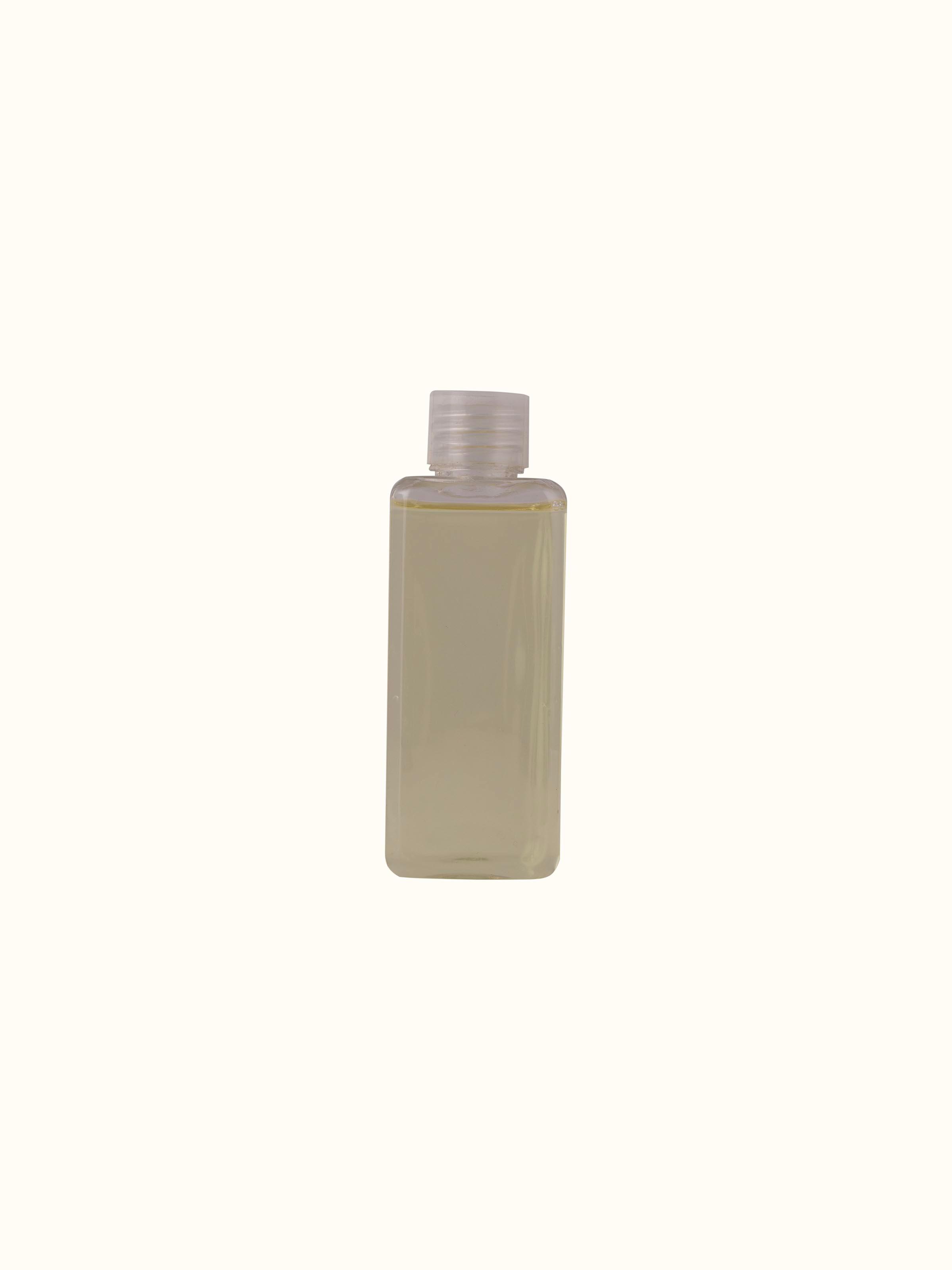 Top-down view of Hibiscus Aroma Reed Diffuser highlighting the reed sticks and bottle cap.
