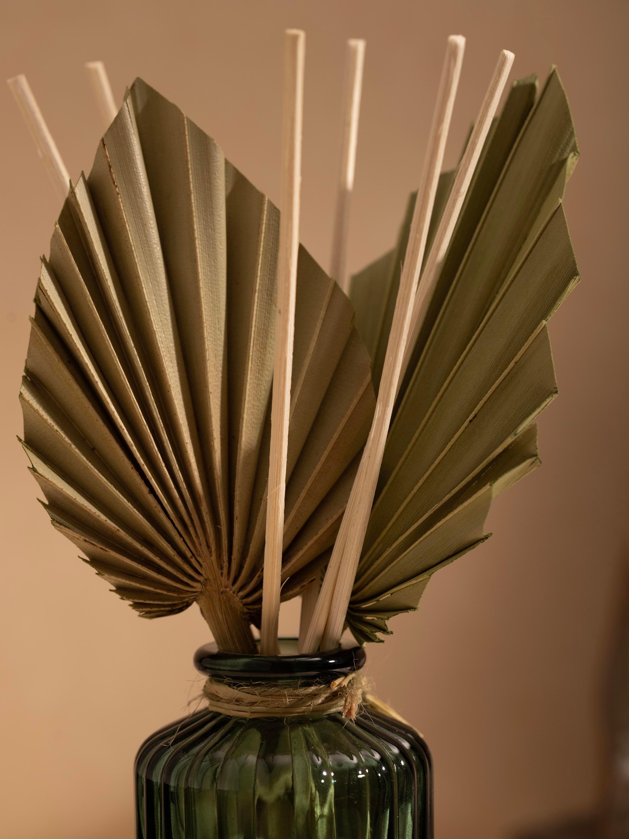 Front view of Hibiscus Aroma Reed Diffuser with a focus on the diffuser bottle and its decorative design elements.